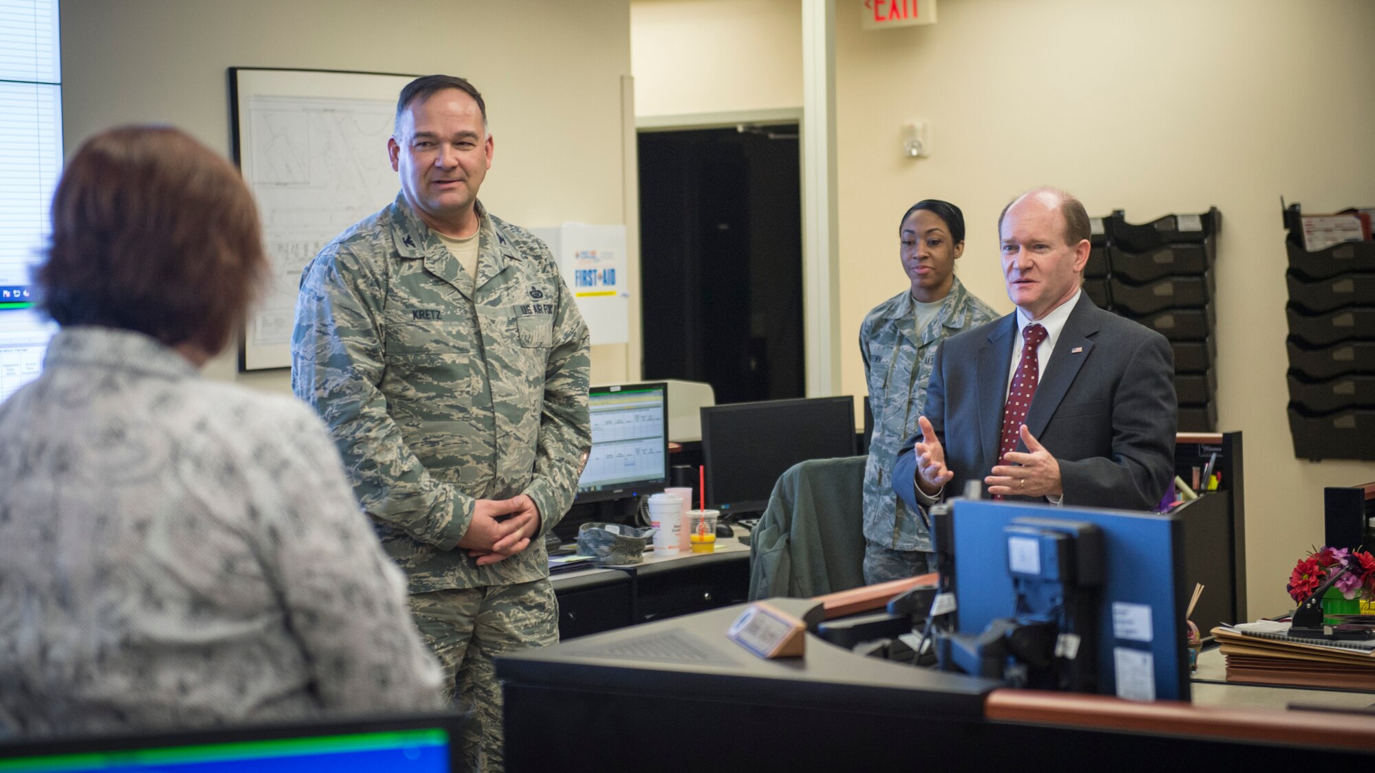 Sen. Chris Coons of Delaware learns about the Human Remains Command, Control and Communication mission Feb. 9, 2015, during a visit to Air Force Mortuary Affairs Operations, Dover Air Force Base, Del. The senator and his staff met with Airmen to learn more about operations at the Department of Defense’s sole port mortuary. (U.S. Air Force photo by Capt. Ray Geoffroy)