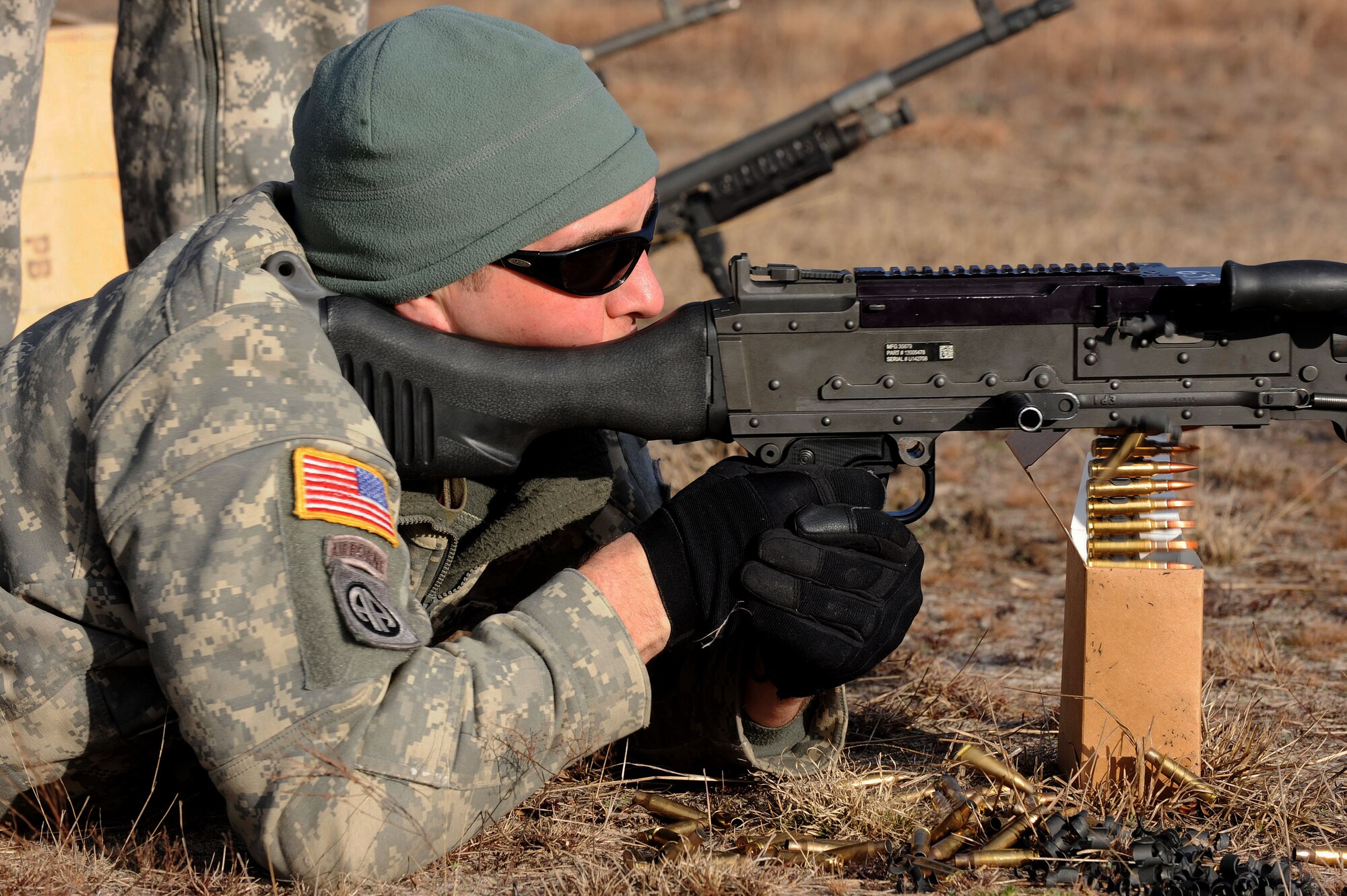 A U.S. Army National Guard soldier assigned to the 1st Battalion, 169th Aviation Regiment, Ft. Bragg, N.C., shoots an M240 machine gun at Poinsett Electronic Combat Range, Sumter, S.C., Feb. 6, 2015. Poinsett Range provides electronic warfare training, munition training, Tactical Air Control Party training, land navigation training, and survival, evasion, resistance, escape training. (U.S. Air Force photo by Airman 1st Class Michael Cossaboom/Released)