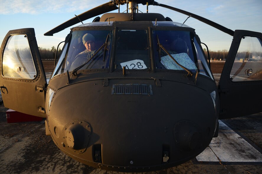 U.S. Army National Guard soldiers assigned to the 1st Battalion, 169th Aviation Regiment, Ft. Bragg, N.C., prepare to start up a UH-60 Black Hawk at Poinsett Electronic Combat Range, Sumter, S.C., Feb. 6, 2015. The range is used by the U.S. Air Force, U.S. Army, U.S. Marine Corps, South Carolina Air National Guard, South Carolina Army National Guard, and North Carolina Army National Guard. (U.S. Air Force photo by Airman 1st Class Michael Cossaboom/Released)