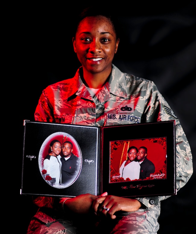 U.S. Air Force Staff Sgt. Denise Brown, 438th Supply Chain Operations Squadron F-15 Eagle and F-22 Raptor mission capable supervisor, plans to spend time with her husband via a video call due to their geographical separation. Regardless of the obstacles ahead, Brown said her personal strength and lessons she’s learned while in the Air Force have turned this challenge into an opportunity for growth. (U.S. Air Force photo by Senior Airman Austin Harvill/Released)