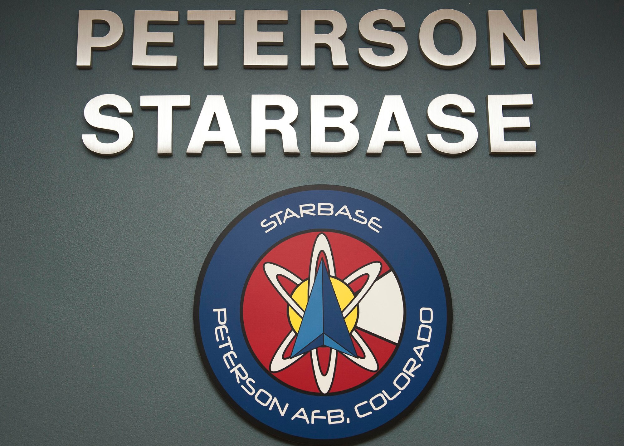 PETERSON AIR FORCE BASE, Colo. – The STARBASE facility opens its doors after a ribbon cutting ceremony, Feb. 2, 2015. After years in the making, the facility will host 25-50 fifth grade students from local elementary schools for five-day programs, where they will learn various lessons in science, technology, engineering and mathematics. (U.S. Air Force photo by Senior Airman Tiffany DeNault)