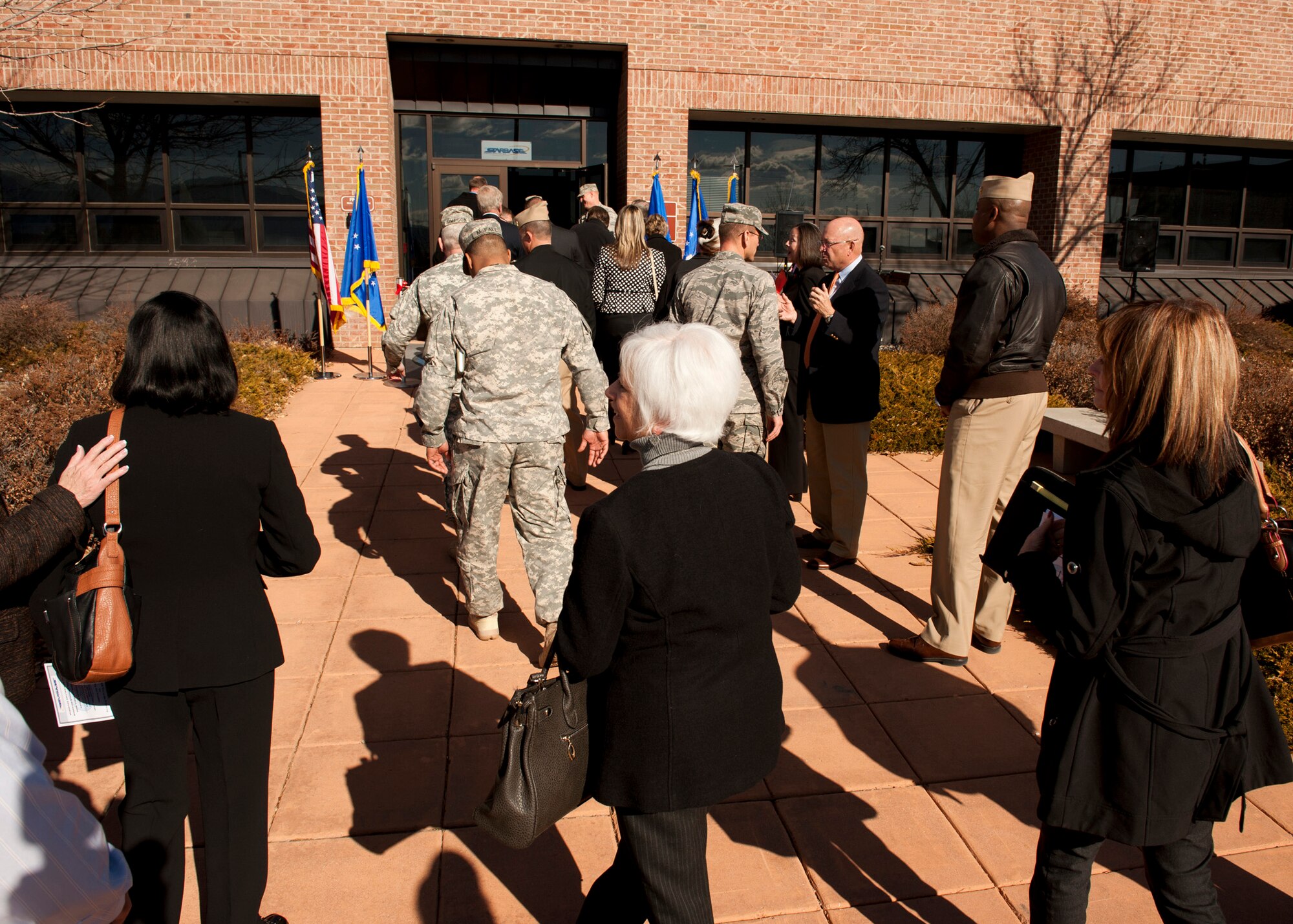PETERSON AIR FORCE BASE, Colo. – The STARBASE facility opens its doors after a ribbon cutting ceremony, Feb. 2, 2015. After years in the making, the facility will host 25-50 fifth grade students from local elementary schools for five-day programs, where they will learn various lessons in science, technology, engineering and mathematics. (U.S. Air Force photo by Senior Airman Tiffany DeNault)