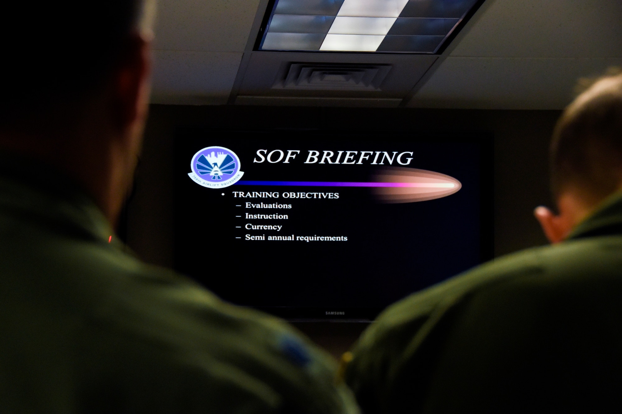 911th Operations Group Aircrew members gather for the morning Supervisor of Flying briefing, Feb. 8, 2015. The SOF briefing allows pilots, navigators, flight engineers, and loadmasters to obtain information pertinent to the mission and their duties before taking flight. (U.S. Air Force photo by Staff Sgt. Justyne Obeldobel)