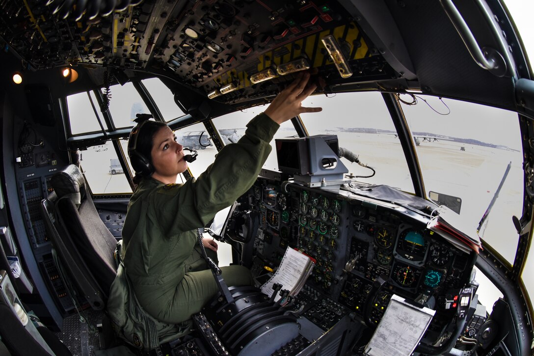 Master Sgt. Rebecca Jackonic, 758th Airlift Squadron flight engineer, performs preflight checks on all the switches and gages that will be used inflight by the pilot and non-flying pilot, Feb. 8, 2015, here. Preflight checks are a vital part of keeping airdrop missions safe and on schedule. (U.S. Air Force photo by Staff Sgt. Justyne Obeldobel)