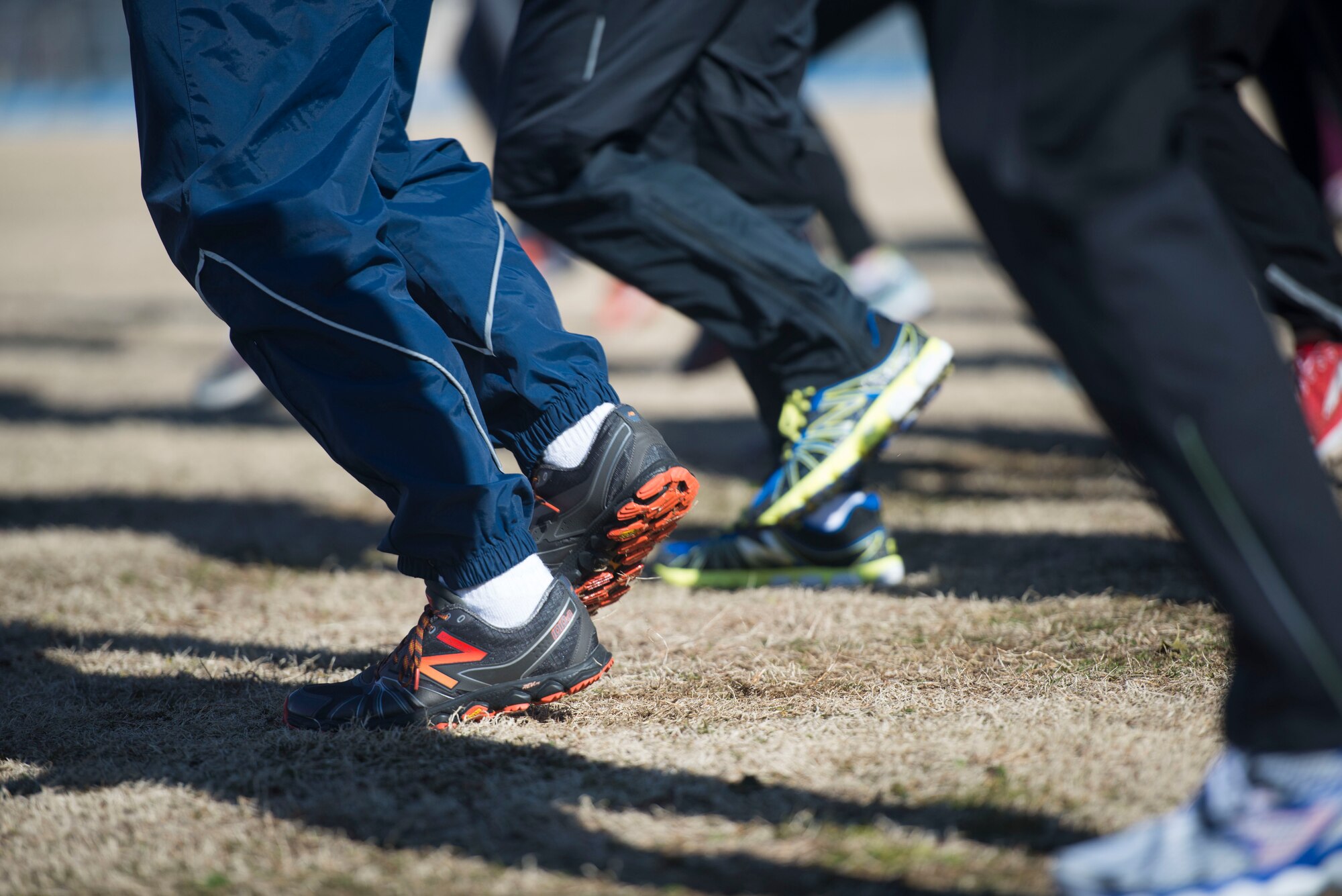 Participants run in place to focus on their natural paces during an efficient running course at Yokota Air Base, Japan, Jan. 31, 2015. The course has been taught throughout the Air Force for the past five years to improve running techniques and give healthy lifestyle tips. (U.S. Air Force photo by Staff Sgt. Cody H. Ramirez/Released)