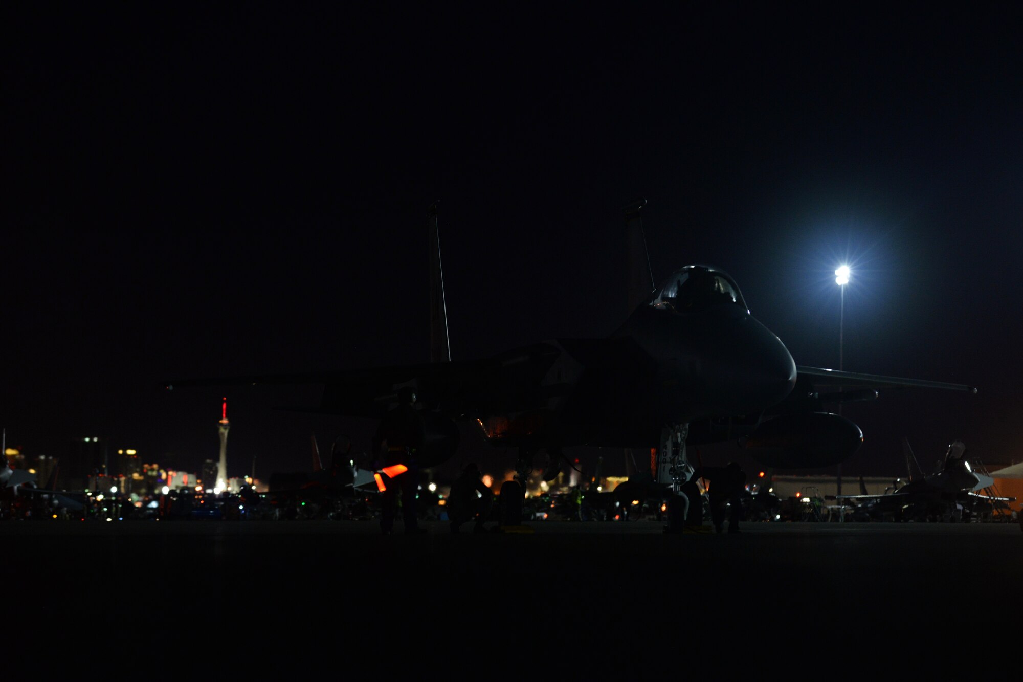 Maintainers assigned to the 748th Aircraft Maintenance Squadron, Royal Air Force Lakenheath, England, inspect an F-15C Eagle assigned to the 493rd Fighter Squadron prior to a sortie during Red Flag 15-1 at Nellis Air Force Base, Nev., Feb. 9, 2015. Maintainers are responsible for overseeing the day-to-day maintenance of aircraft, including diagnosing malfunctions and replacing components, and conducting various inspections to ensure the aircraft is functioning properly. (U.S. Air Force photo by Tech. Sgt. Eric Burks/Released)