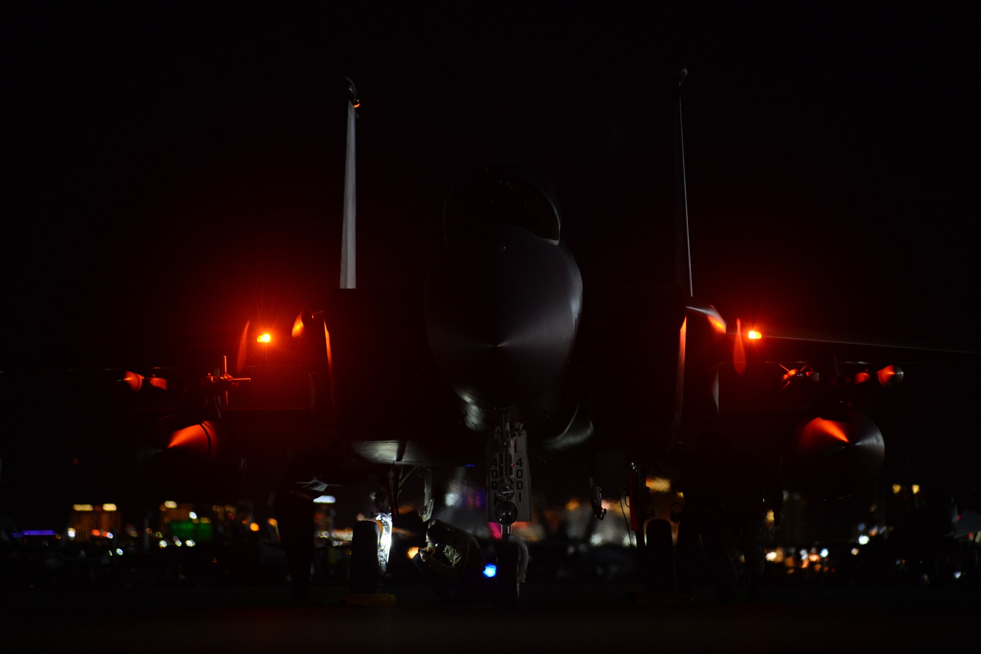 Two maintainers assigned to the 748th Aircraft Maintenance Squadron, Royal Air Force Lakenheath, England, inspect an F-15C Eagle assigned to the 493rd Fighter Squadron prior to a sortie during Red Flag 15-1 at Nellis Air Force Base, Nev., Feb. 9, 2015. Red Flag is a realistic combat exercise involving U.S. and allied air forces conducting training operations on the 15,000 square mile Nevada Test and Training Range. (U.S. Air Force photo by Tech. Sgt. Eric Burks/Released)