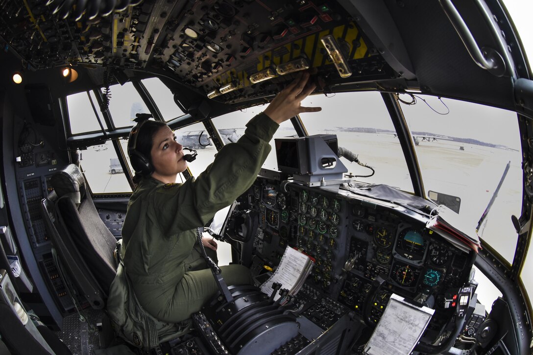 Master Sgt. Rebecca Jackonic, 758th Airlift Squadron flight engineer, performs preflight checks on all the switches and gages that will be used inflight by the pilot and non-flying pilot, Feb. 8, 2015, here. Preflight checks are a vital part of keeping airdrop missions safe and on schedule. (U.S. Air Force photo by Staff Sgt. Justyne Obeldobel) 