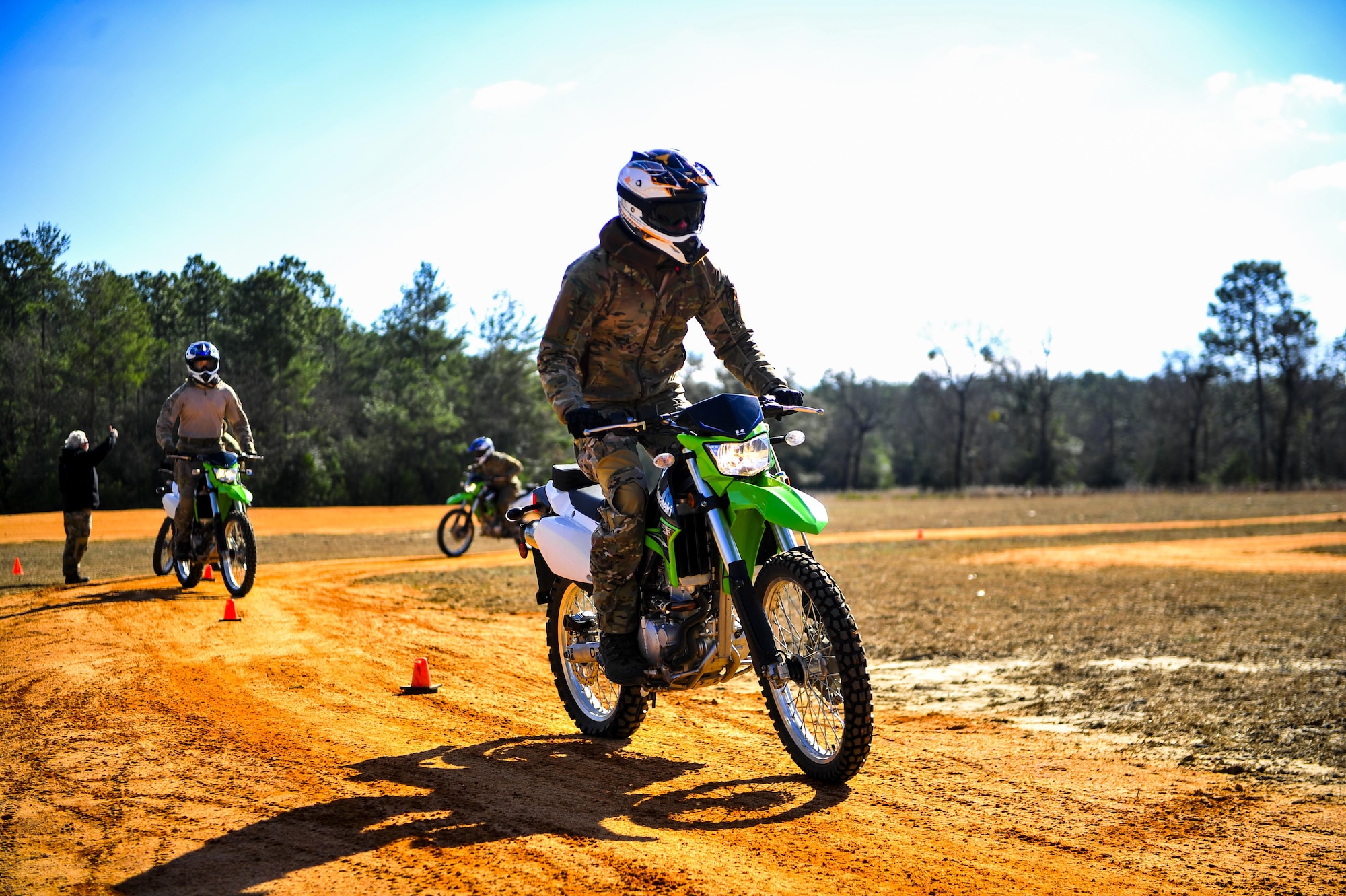 Members from the Special Tactics Training Squadron, 24th Special Operations Wing, Hurlburt Field, Fla., learn how to ride dirt bikes during an advanced tactical vehicle training at Eglin Range, Fla., Feb. 1-4, 2014. The STTS delivers advanced and special tactics skills to a wide variety of joint special operations career fields, including combat controllers and special tactics pararescuemen. (U.S. Air Force photo by Senior Airman Christopher Callaway/Released)