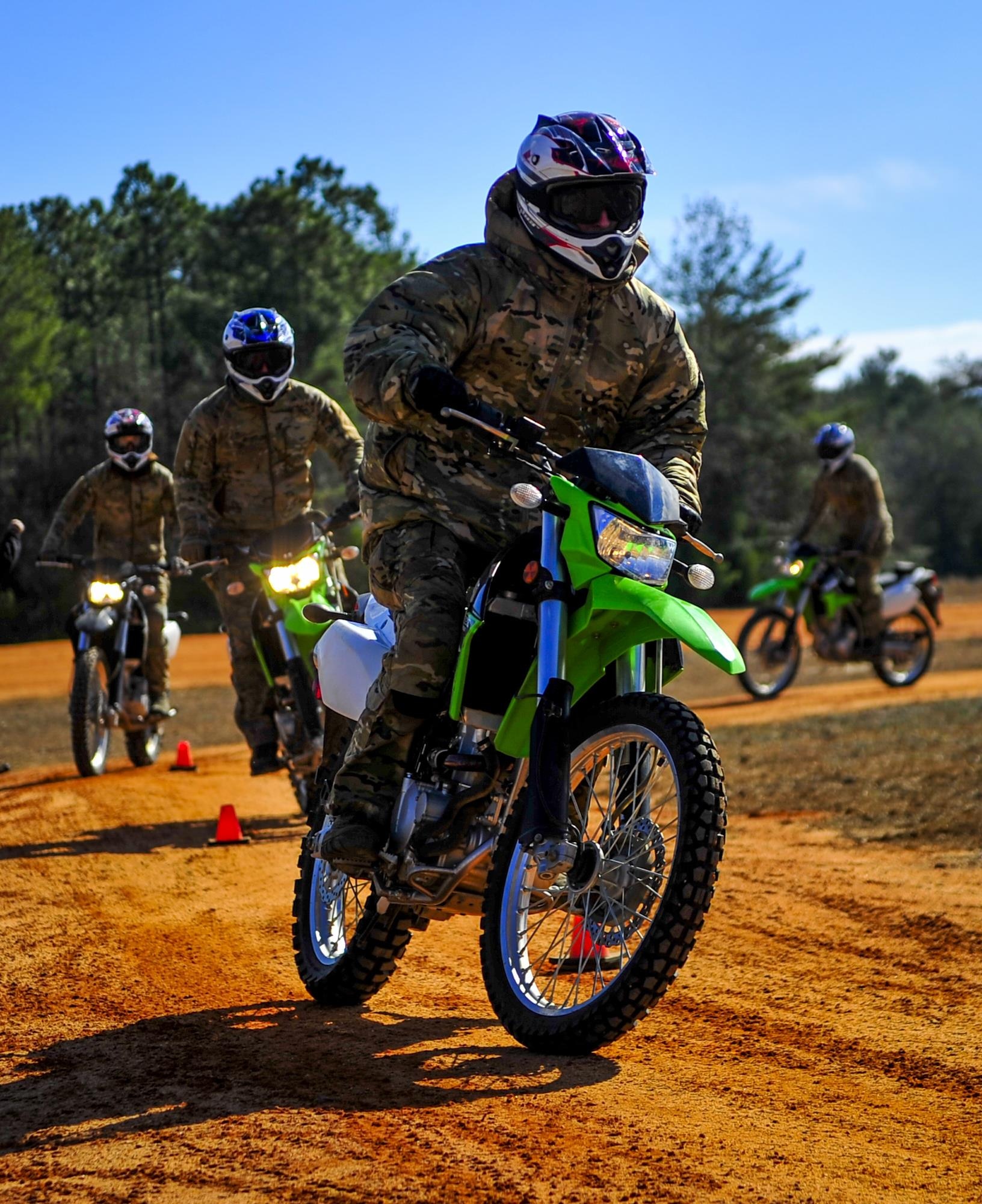 Members from the Special Tactics Training Squadron, 24th Special Operations Wing, Hurlburt Field, Fla., learn how to ride dirt bikes during an advanced tactical vehicle training at Eglin Range, Fla., Feb. 1-4, 2014. The STTS delivers advanced and special tactics skills to a wide variety of joint special operations career fields, including combat controllers and special tactics pararescuemen. (U.S. Air Force photo by Senior Airman Christopher Callaway/Released)