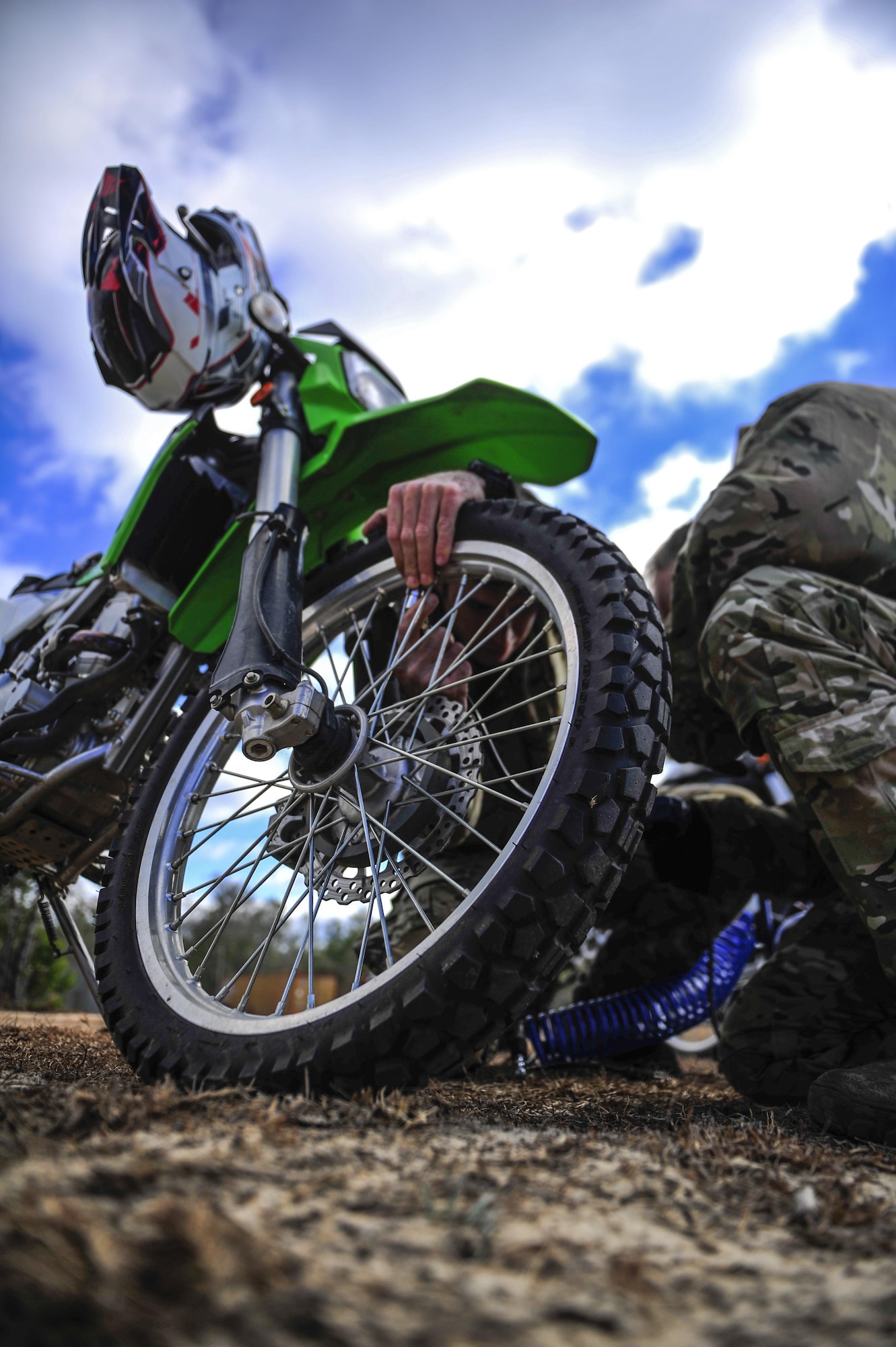 Members from the Special Tactics Training Squadron, 24th Special Operations Wing, Hurlburt Field, Fla., learn how to ride dirt bikes during an advanced tactical vehicle training at Eglin Range, Fla., Feb. 1-4, 2014. The STTS delivers advanced and special tactics skills to a wide variety of joint special operations career fields, including combat controllers and special tactics pararescuemen. (U.S. Air Force photo by Senior Airman Christopher Callaway/Released)