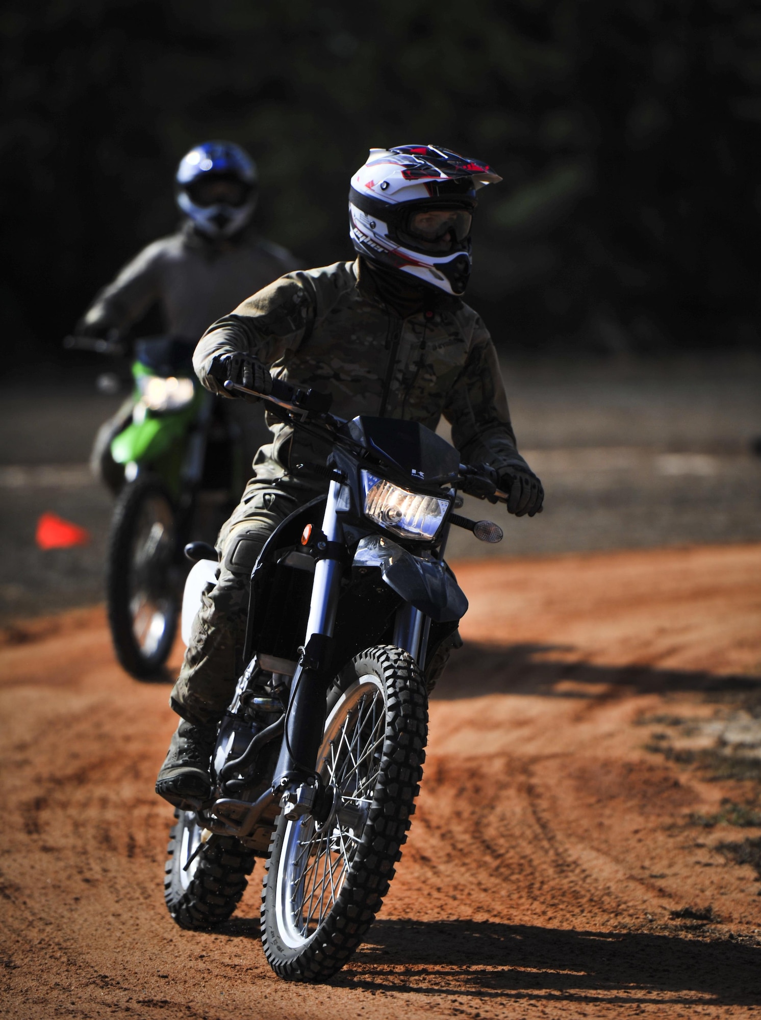 Members from the Special Tactics Training Squadron, 24th Special Operations Wing, Hurlburt Field, Fla., learn how to ride dirt bikes during an advanced tactical vehicle training at Eglin Range, Fla., Feb. 1-4, 2014. The STTS delivers advanced and special tactics skills to a wide variety of joint special operations career fields, including combat controllers and special tactics pararescuemen. (U.S. Air Force photo by Senior Airman Christopher Callaway/Released)