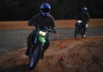 Members from the Special Tactics Training Squadron, 24th Special Operations Wing, Hurlburt Field, Fla., learn how to ride dirt bikes during an advanced tactical vehicle training at Eglin Range, Fla., Feb. 1-4, 2014. The STTS delivers advanced and special tactics skills to a wide variety of joint special operations career fields, including combat controllers and special tactics pararescuemen. (U.S. Air Force photo by Senior Airman Christopher Callaway/Released)