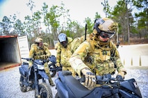 Airmen from the Special Tactics Training Squadron, 24th Special Operations Wing, Hurlburt Field, Fla., learn how to operate all-terrain vehicles during advanced tactical vehicle training at Eglin Range, Fla., Feb 1-4, 2015. The STTS trains special operations forces, including combat controllers and special tactics pararescueman, for rapid global employment to enable airpower success in austere and hostile environments. (U.S. Air Force photo by Senior Airman Christopher Callaway/Released)