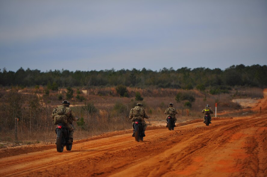 Airmen from the Special Tactics Training Squadron, 24th Special Operations Wing, Hurlburt Field, Fla., learn how to operate all-terrain vehicles during advanced tactical vehicle training at Eglin Range, Fla., Feb 1-4, 2015. The STTS trains special operations forces, including combat controllers and special tactics pararescueman, for rapid global employment to enable airpower success in austere and hostile environments. (U.S. Air Force photo by Senior Airman Christopher Callaway/Released)
