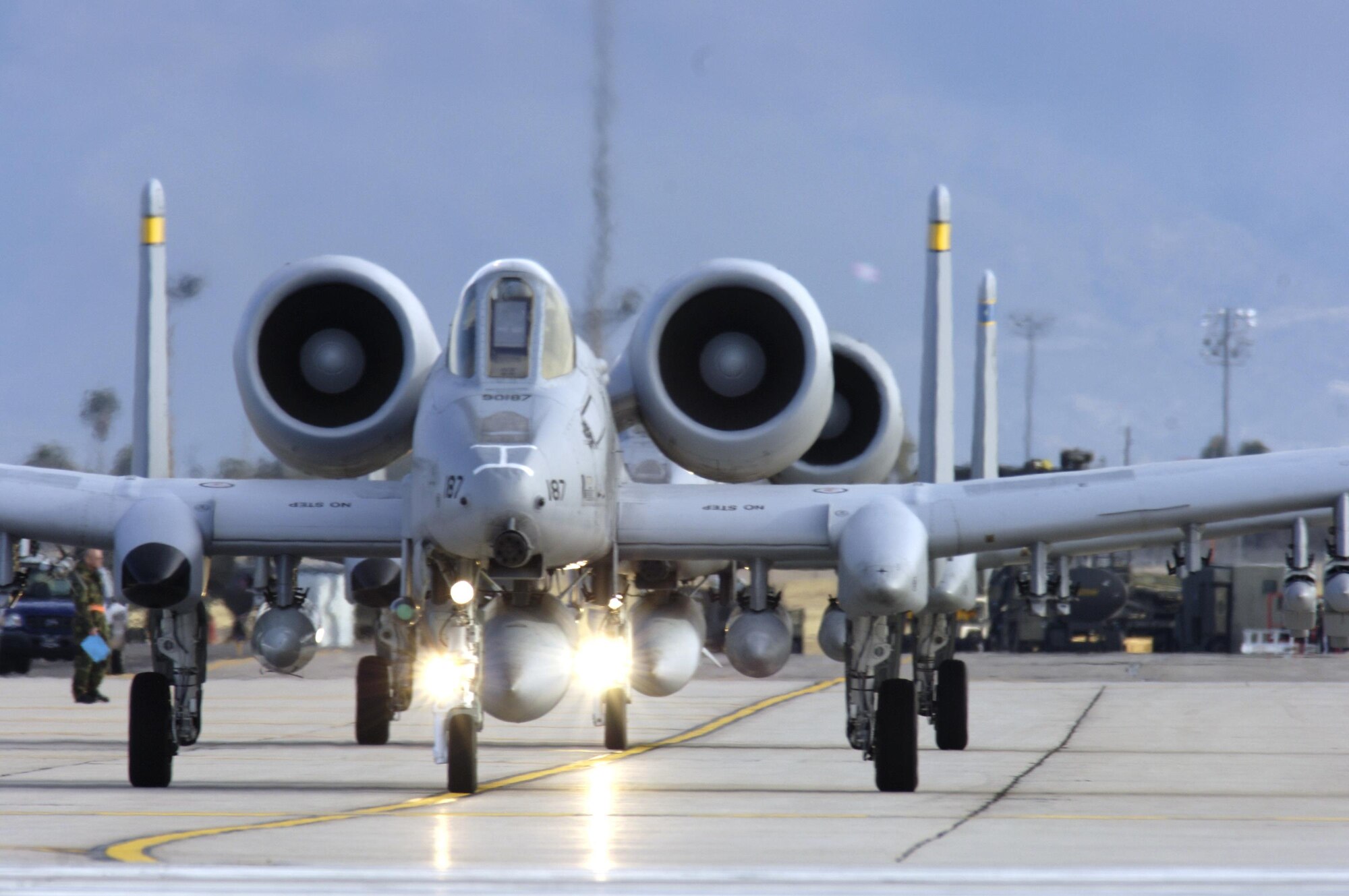 Pilots from the 354th Fighter Squadron taxi down the tarmac preparing to take off in their A-10 Thunderbolt IIs to a simulated deployed location as a part of exercise Bushwhacker 07-02 Jan. 21, 2007, at Davis-Monthan Air Force Base, Arizona. (U.S. Air Force photo/Senior Airman Jesse Shipps)
