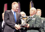 Army Maj. Gen. Ed Wright, the adjutant general of Wyoming, accepts the Secretary of Defense 2010 Environmental Award for Cultural Resources Management from Deputy Secretary of Defense William Lynn III at the Pentagon June 2, 2010.