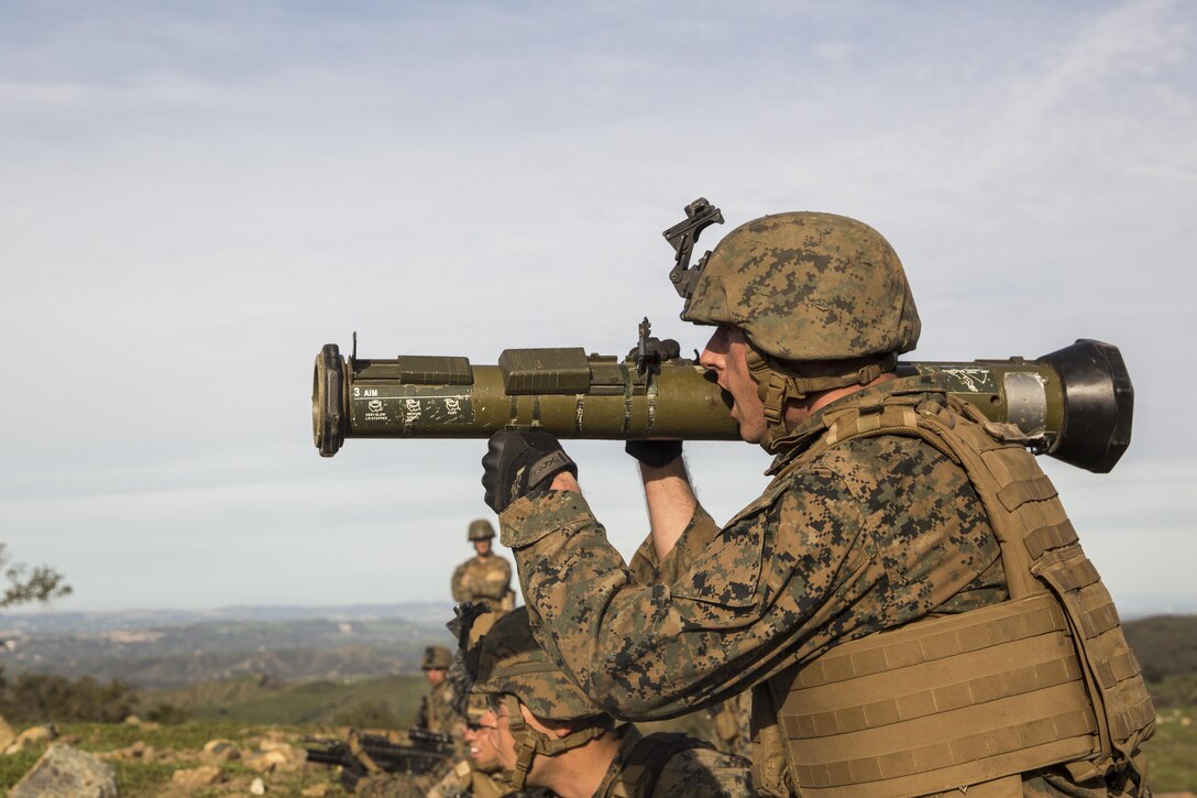 U.S. Marine Lance Cpl. Alex Hunt engages a target with an antitank missile trainer during squad tactics and maneuver training aboard Camp Pendleton, Calif., Jan. 28, 2015. Hunt is a rifleman with Kilo Company, Battalion Landing Team 3rd Battalion, 1st Marine Regiment, 15th Marine Expeditionary Unit. As the ground combat element for the 15th MEU, BLT 3/1 is preparing for their upcoming deployment by enhancing their combat skills and learning to work as a cohesive unit. (U.S. Marine Corps Photo by Sgt. Emmanuel Ramos/Released)