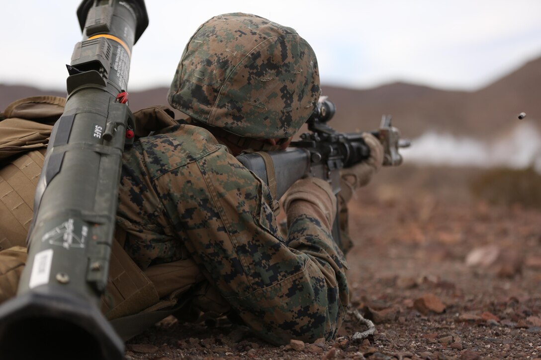 Lance Cpl. Netanel Frankel, rifleman, Company I, 3rd Battalion, 7th Marine Regiment, a native of Chicago, Ill., fires at a target during the offensive assault at the Morgan’s Well training during the Marine Corps Combat Readiness Evaluation Exercise, Jan. 18, 2015. (Official Marine Corps Photo by  Lance Cpl. Julio McGraw/Released)