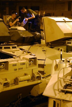 Marines with the Offload Preparation Party onboard the Maritime Prepositioning Force ship, USNS Pililaau, perform pre-operation checks, Feb. 6, in order to support Exercise Cobra Gold 2015. Their mission is to prepare and offload supplies and equipment from ship to shore. 