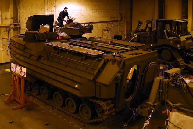 Cpl. Brock W. English with the Offload Preparation Party ensures all parts are operational on the Assault Amphibious Vehicles aboard the Maritime Prepositioning Force ship, USNS Pililaau, Feb. 6. The OPP Marines conducted pre-operation checks on all of the vehicles aboard the ship. Their mission is to prepare and offload the equipment from ship to shore for use during Exercise Cobra Gold 2015. Cobra Gold is an annual Thailand /United States, co-sponsored multinational and joint theater security cooperation exercise, conducted in the Kingdom of Thailand. This year 25 nations are participating. English is an AAV crewman with General Support Platoon, and a Lampasas, Texas, native. 