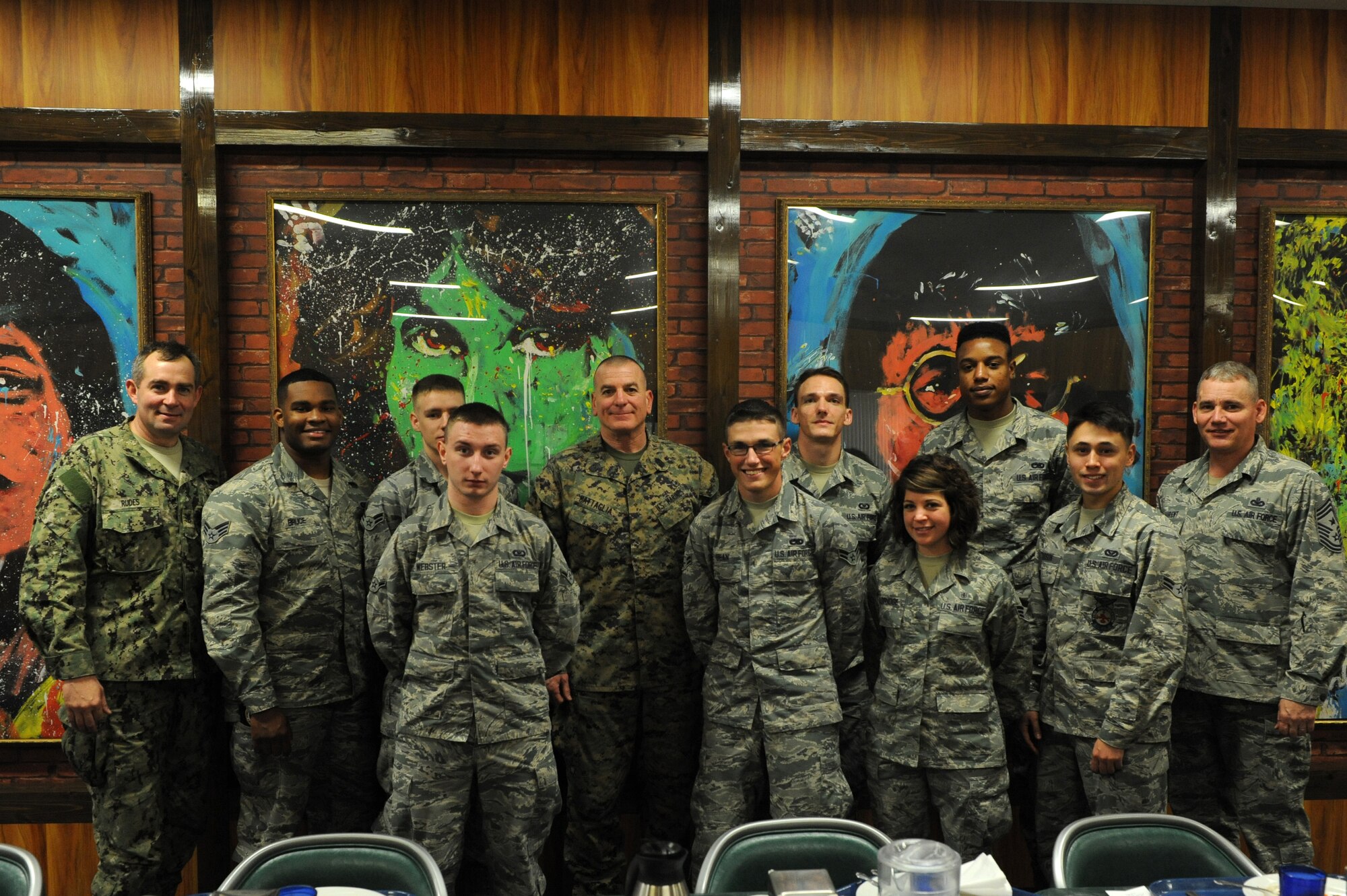 U.S. Marine Sgt. Maj. Bryan Battaglia, senior enlisted advisor to the chairman of the Joint Chiefs of Staff, talks with Airmen from Team Kadena during a lunch at the Marshall dining facility on Kadena Air Base, Japan, Feb. 8, 2015. Battaglia listened to the Airmen and had conversations about changes that they want to see at Kadena as well as mentoring them on what being a leader means. (U.S. Air Force photo by Airman 1st Class Stephen G. Eigel)
