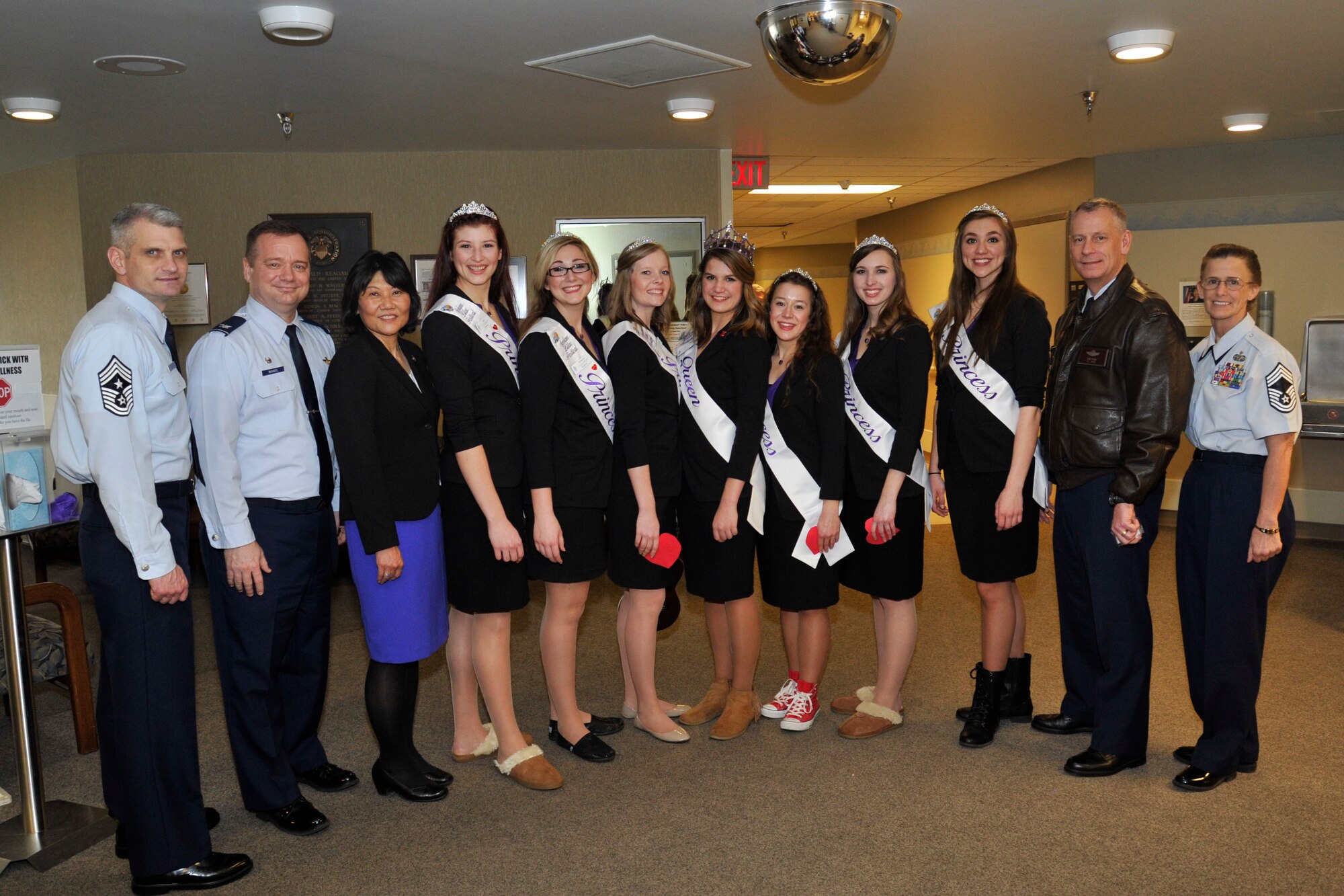 Team Fairchild leaders crossed paths with the Lilac princesses during their visit to the Spokane Veteran Medical Center Feb. 11, 2015, in Spokane, Wash. The National Salute to Veterans Patients Program invites military personnel, individuals, civic organizations, businesses, schools and local media to pay tribute to veterans and the sacrifices they’ve made for our country. (U.S. Air Force photo/Airman 1st Class Nicolo J. Daniello)