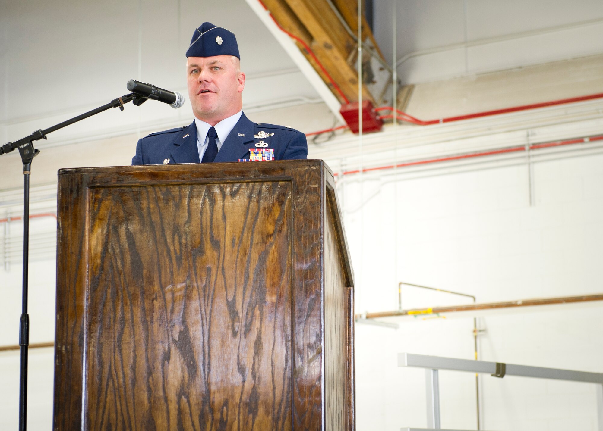 Lieutenant Colonel Richard Wageman, incoming 429th Reserve Air Combat Training Squadron commander, addresses the audience during a change of command ceremony Feb. 12, 2015 at Holloman Air Force Base, N.M. The 429 RACTS supports three regular Air Force formal training squadrons at Holloman with MQ-1 Predator and MQ-9 instructor pilots, sensor operators and mission intelligence coordinators. (U.S. Air Force photo by Staff Sgt. Stacy Moless/Released)