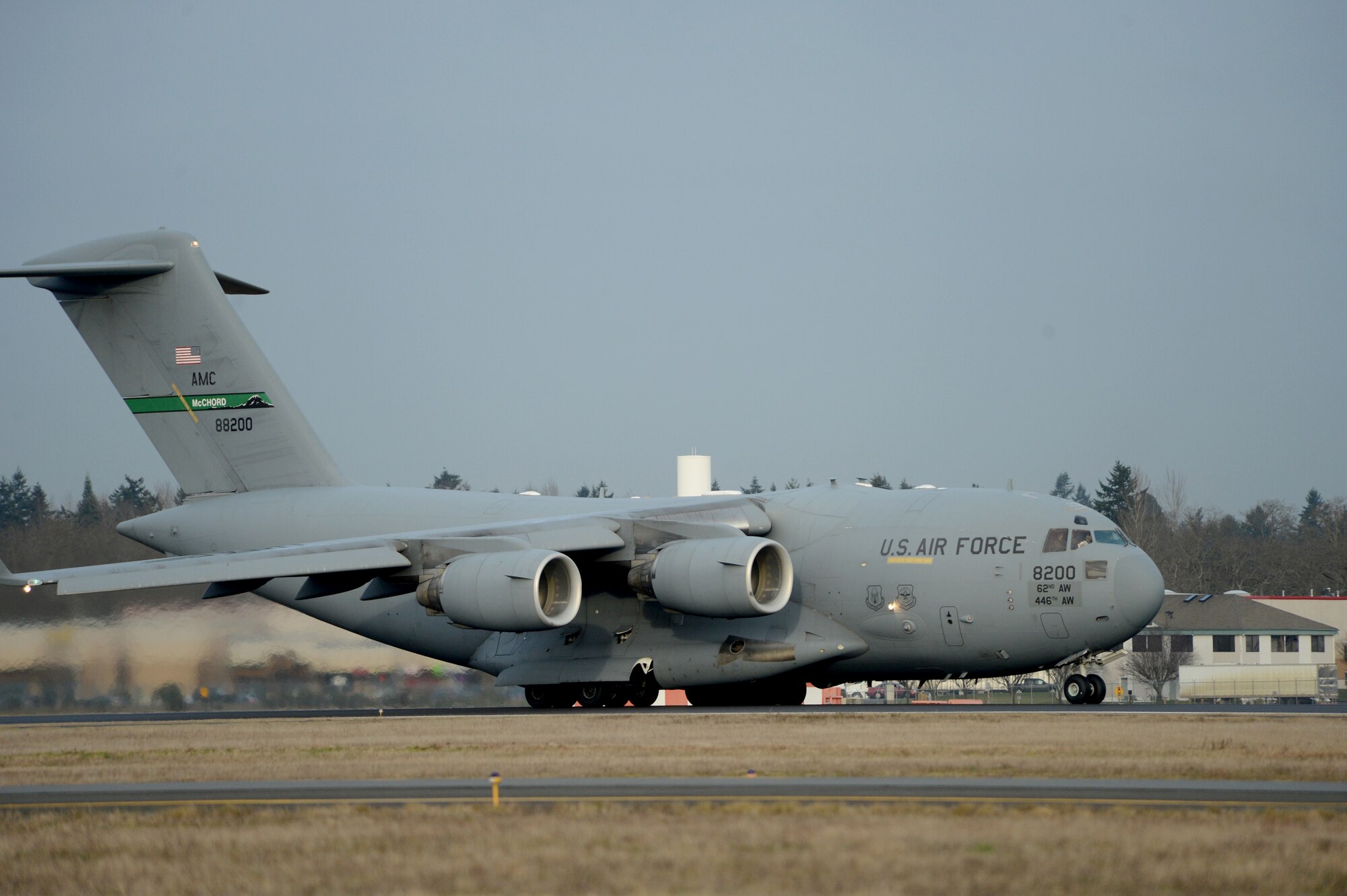 A Team McChord C-17 Globemaster III taxis out onto a runway Feb. 3, 2015, during Exercise SNAPSHOT at Joint Base Lewis-McChord, Wash. The purpose of the exercise was to test deployment readiness and ability to execute direct delivery combat operation of McChord Airmen. (U.S. Air Force photo/Airman 1st Class Keoni Chavarria)