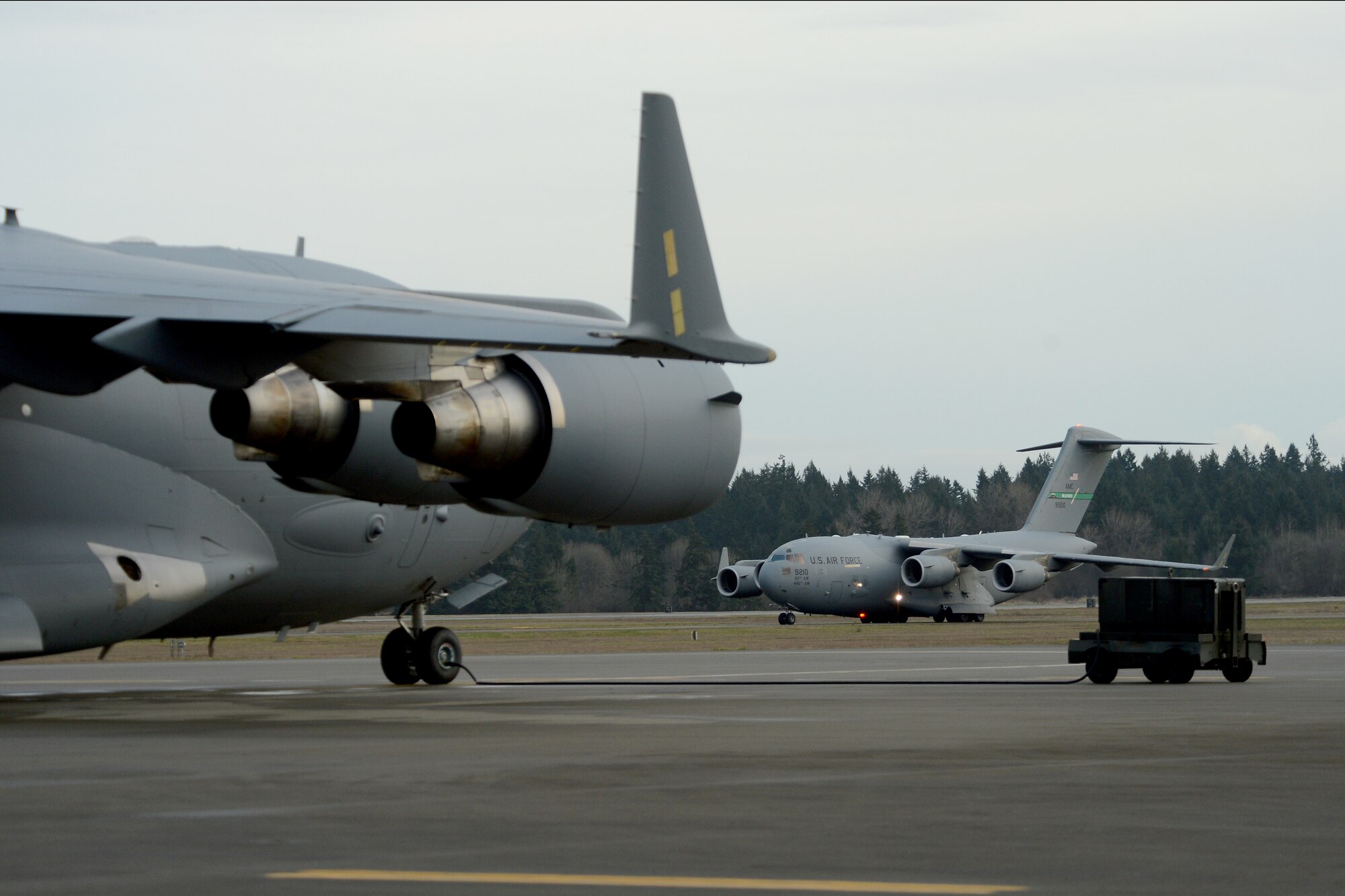 A Team McChord C-17 Globemaster III taxis in Feb. 3, 2015, during Exercise SNAPSHOT at Joint Base Lewis-McChord, Wash. After the dedicated planning of Exercise SNAPSHOT, members from both sides of JBLM carried out their distinct duties. (U.S. Air Force photo/Airman 1st Class Keoni Chavarria)