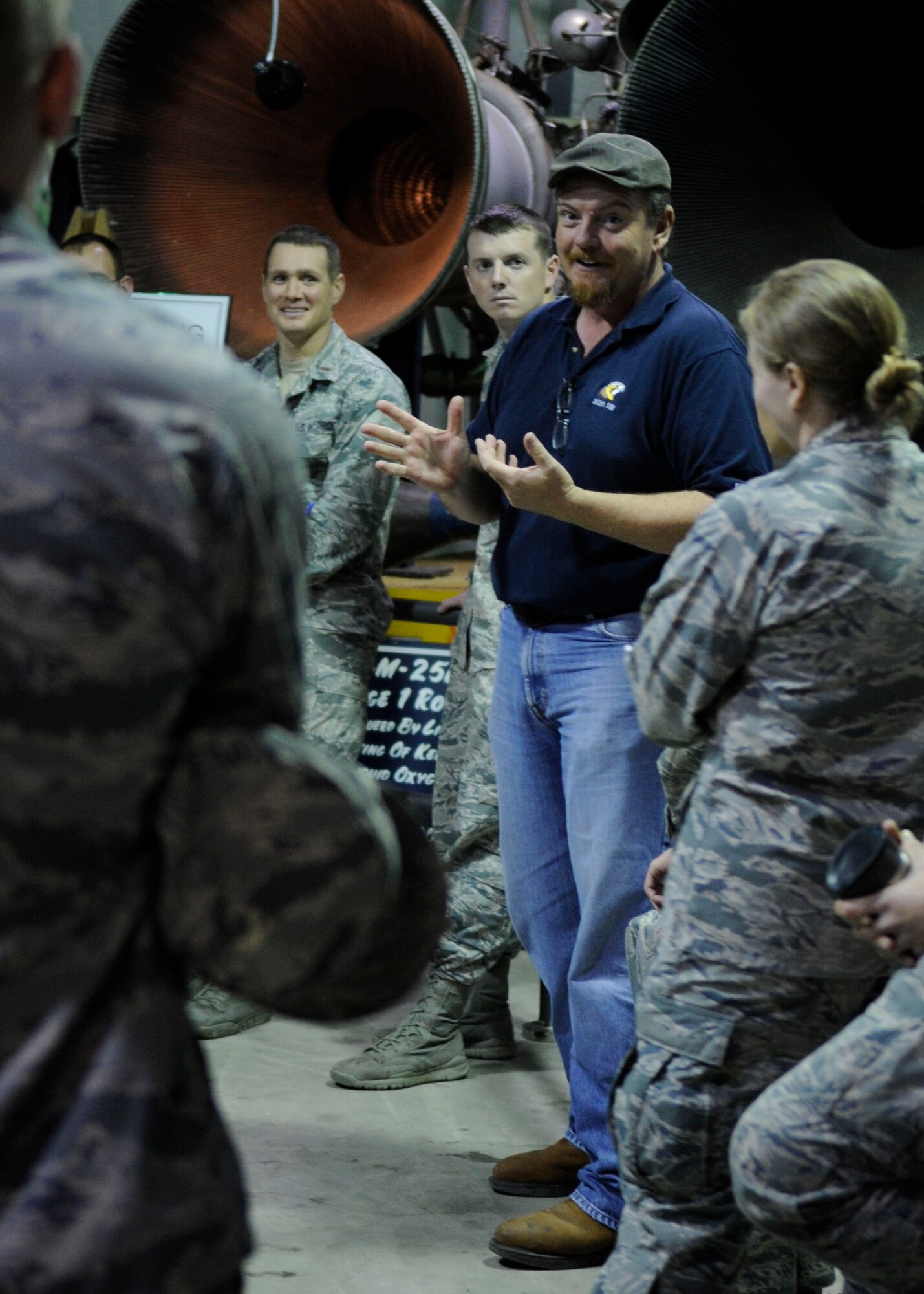 Jay Prichard, 30th Space Wing curator of the Space and Missile Heritage Center, jokes with students from the 533rd Training Squadron while conducting a tour of the Space and Missile Heritage Center, Feb. 9, 2015, Vandenberg Air Force Base, Calif. (U.S. Air Force photo by Senior Airman Shane M. Phipps/Released)

