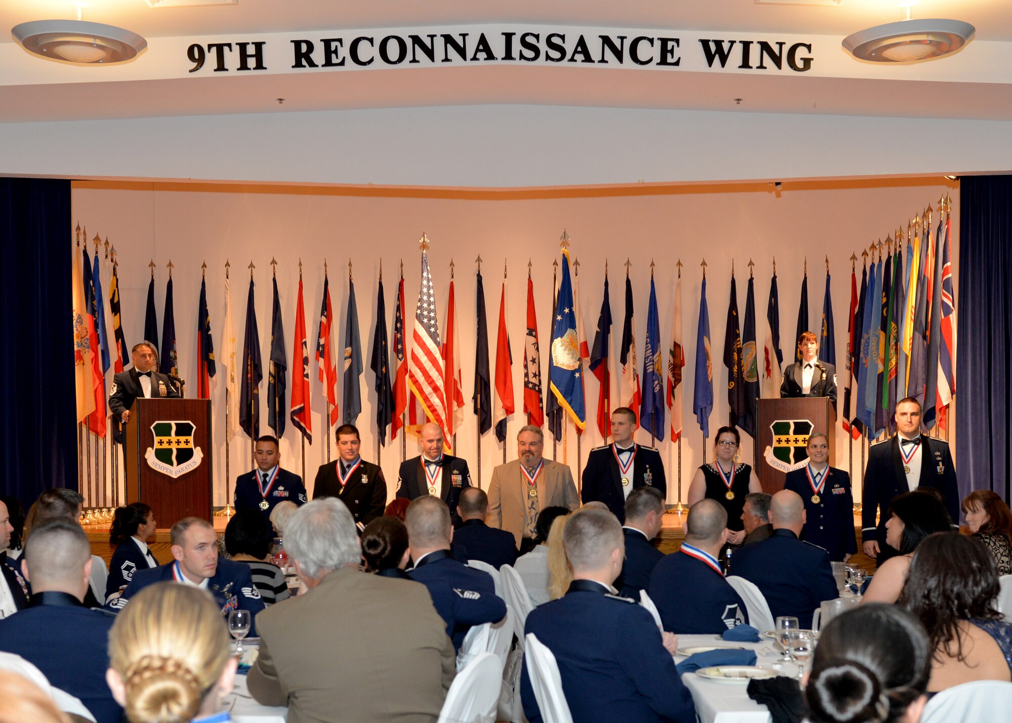 Team Beale's 2014 Annual Award winners pose for a picture at the Community Activity Center on Beale Air Force Base, Calif., Feb. 6, 2015. Award winners were recognized for their outstanding work, dedication and volunteerism at Beale and in the local community. (U.S. Air Force photo by Staff Sgt. Robert M. Trujillo/Released)   