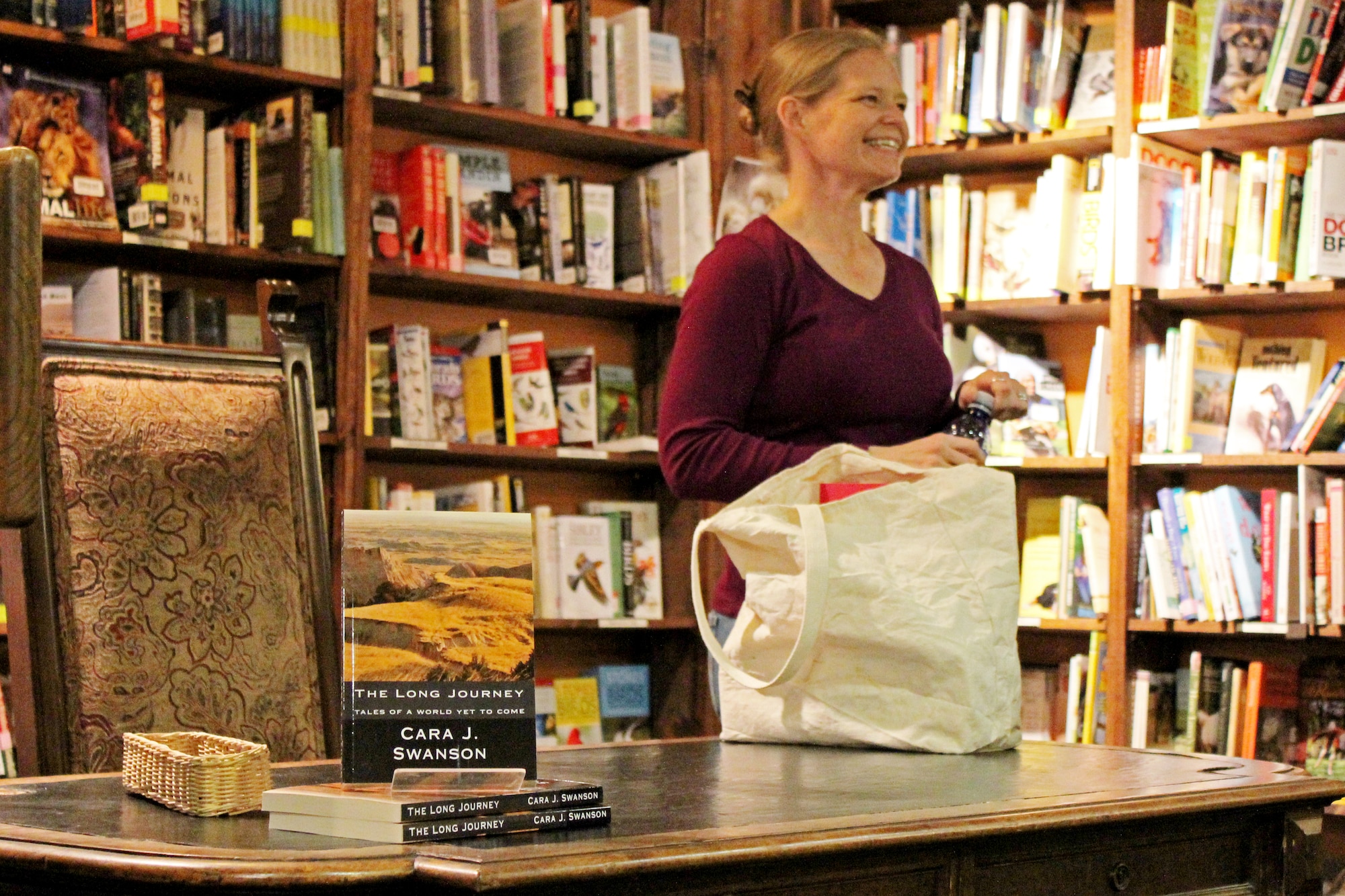 Capt. Cara J. Swanson, an Individual Mobilization Augmentee assigned to the 566th Intelligence Squadron, discusses her recently published novel, The Long Journey, Tales from a World Yet to Come, at Denver-area bookstore, the Tattered Cover, Jan. 27. The science fiction novel won second place in the 2014 Kindle Awards Best Fiction category.