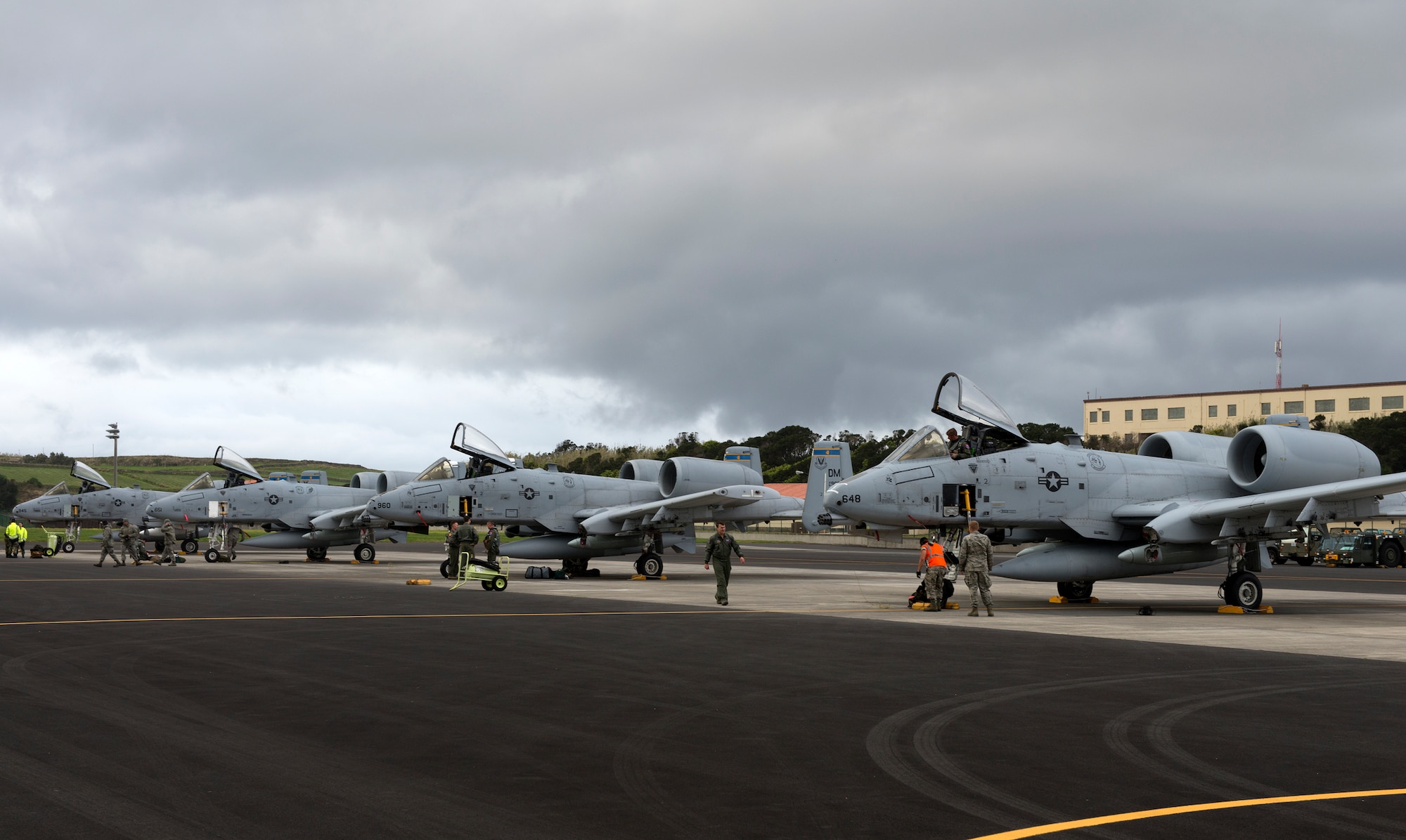 A-10 Thunderbolt IIs park on the flight line at Lajes Field, Azores, Portugal, Feb. 11, 2015. The A-10s are deploying as part of a Theater Security Package heading to Europe. These European deployments underscore U.S. commitment to NATO allies, regional partners and U.S. security obligations. The A-10s and Airmen are deploying from the 355th Fighter Wing, Davis-Monthan AFB, Ariz. (U.S. Air Force photo/Staff Sgt. Zachary Wolf)