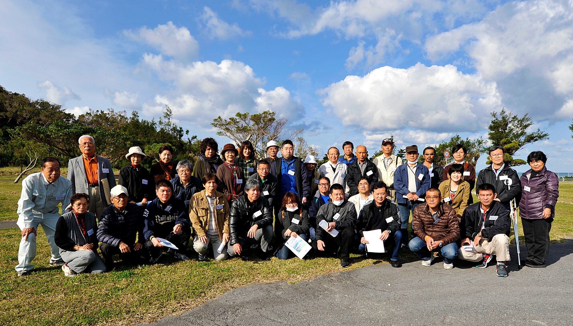 Members from the Chatan Hometown Association pose for a group photo during their sacred site visit on Kadena Air Base, Okinawa, Japan, Feb. 11, 2015. A total of 35 members from the Chatan Hometown Association visited three sacred sites on Kadena Air Base. The purpose of the tour was to show the important historical sites of their ancestors to a younger generation. (U.S. Air Force photo by Naoto Anazawa)

