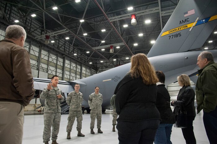 JOINT BASE CHARLESTON, S.C. – Tech. Sgt. Nolan Gibson, 437th Maintenance Squadron Home Station Check dock chief and coordinator, briefs a group of community leaders during an evening tour at Joint Base Charleston, S.C., Feb. 11, 2015. The tour exposed the leaders to the important contributions of Charleston’s Nighttime Warriors. Gibson explained the process for providing in-depth home station checks for every C-17 Globemaster III in the base’s inventory—a process each plane must undergo every 120 days. (U.S. Air Force Photo/Capt. Christopher Love)