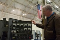 JOINT BASE CHARLESTON, S.C. – Marc Tye, Joint Base Charleston Advisory Council member, examines an ESSEX Generator during a tour for community leaders Feb. 11, 2015 at Joint Base Charleston, S.C. The tour exposed the leaders to the important contributions of Charleston’s Nighttime Warriors. (U.S. Air Force Photo/Capt. Christopher Love)

