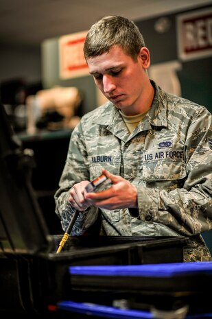 Senior Airman Joshua Kilburn, a support specialist with the 437th Aircraft Maintenance Squadron, inspects a launch kit to ensure accountability on tools at Joint Base Charleston, S.C., Feb. 10, 2015. Kilburn and his team are accountable for over $18 million in tools that support all flight line operations. (U.S. Air Force photo/Tech. Sgt. Renae Pittman)