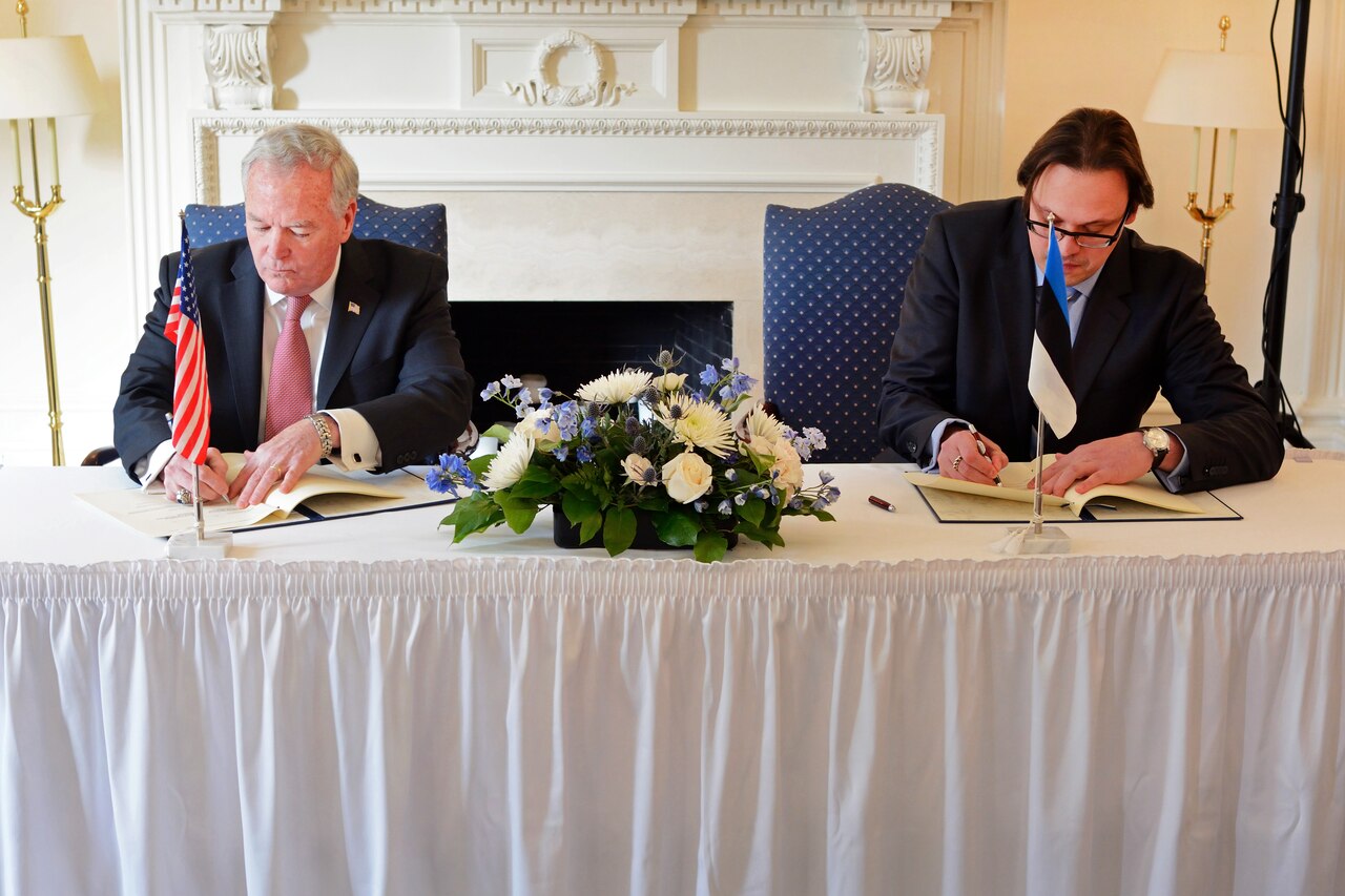 Acting Assistant Defense Secretary for Reserve Affairs Richard O. Wightman, Jr. and Estonia Ambassador Eerik Marmei sign an official agreement Feb. 10 at the Estonian embassy expanding opportunities for guardsmen and reservists to exchange forces in order to improve NATO interoperability.  The Military Reserve Exchange Program (MREP) specifically calls for exchanges in cyber, maneuver and special warfare.  The MREP with Estonia joins existing programs with Germany, the United Kingdom and Denmark.  More than 300 MREP exchanges occur each year. DoD photo by Steve Turner