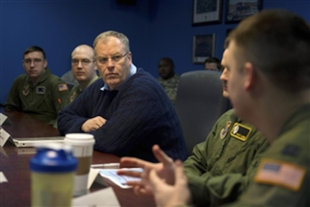 Deputy Defense Secretary Bob Work speaks with missile alert crew members on Minot Air Force Base, N.D., Feb. 11, 2015. During his visit, Work met with nuclear enterprise airmen and toured the facilities. 