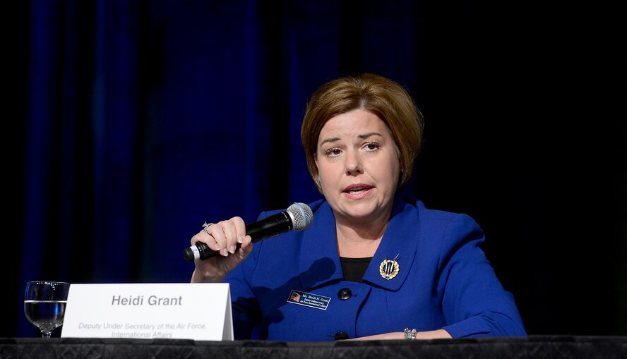 Heidi Grant moderates a panel discussion during the Air Force Association's annual Air Warfare Symposium and Technology Exposition Feb. 12, 2015, in Orlando, Fla. The panel included Maj. Gen. Henrik Dam, from the Royal Danish air force; Air Commodore Gary Martin, from the Royal Australian air force; and Lt. Col. Hassan Mohammed Ali Alanazi, from the United Arab Emirates air force. Grant is the the deputy under secretary of the Air Force, International Affairs. (U.S. Air Force photo/Scott M. Ash) 