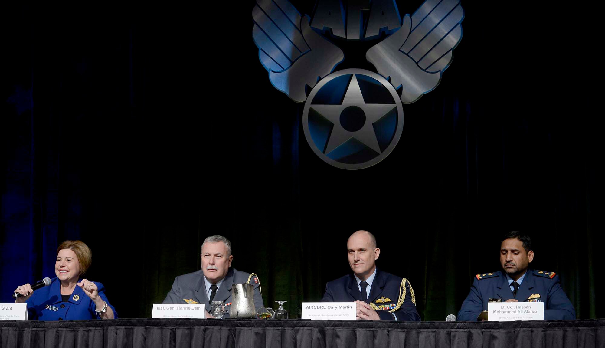 Heidi Grant moderates a panel discussion during the Air Force Association's annual Air Warfare Symposium and Technology Exposition Feb. 12, 2015, in Orlando, Fla. The panel included Maj. Gen. Henrik Dam, from the Royal Danish air force; Air Commodore Gary Martin, from the Royal Australian air force; and Lt. Col. Hassan Mohammed Ali Alanazi, from the United Arab Emirates air force. Grant is the deputy under secretary of the Air Force, International Affairs. (U.S. Air Force photo/Scott M. Ash) 