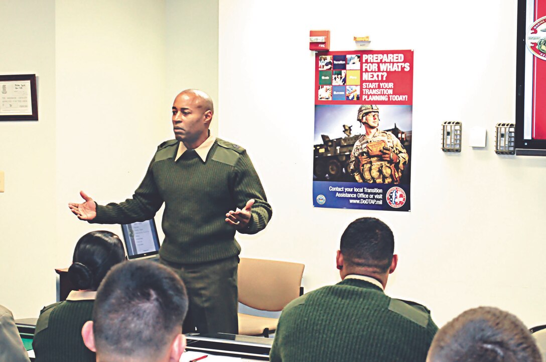 Sgt. Maj. Mark A. Byrd Sr., base sergeant major, Marine Corps Base Quantico, speaks Friday to the 23 Marines taking the inaugural Personal Readiness Seminar at the Chapel Annex.