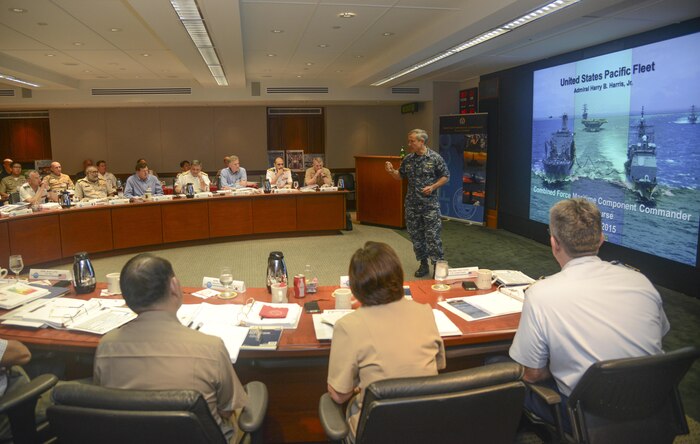 PEARL HARBOR (Feb. 5, 2015) Adm. Harry B. Harris Jr., commander of U.S. Pacific Fleet, briefs flag officers during the Naval War College's Combined Force Maritime Component Commander Flag Officer Course. Participants from 15 nations around the Pacific region came to discuss regional maritime security issues and strengthen relationships.