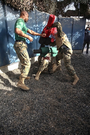 Recruits of Bravo Company, 1st Recruit Training Battalion, fight each other during a pugil sticks match at Marine Corps Recruit Depot San Diego, Feb. 2. To win, a recruit must land a strike to the head or land more strikes to the body than his opponent.