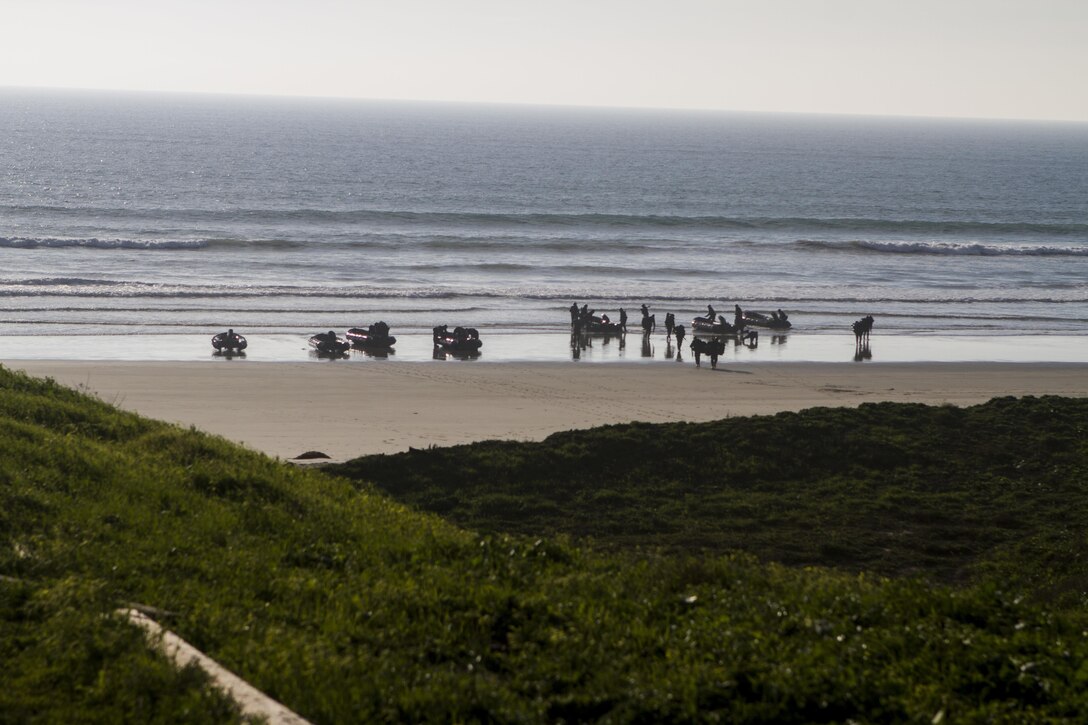 Marines with 1st Reconnaissance Battalion, 1st Marine Division, and members of the Japan Ground Self-Defense Force conduct amphibious raids and military operations on urban terrain aboard Marine Corps Base Camp Pendleton, Calif., Feb. 3, 2015, during Exercise Iron Fist. Exercise Iron Fist is an annual bilateral training exercise between U.S. and Japanese military forces that builds their combined ability to conduct amphibious and land-based contingency operations.