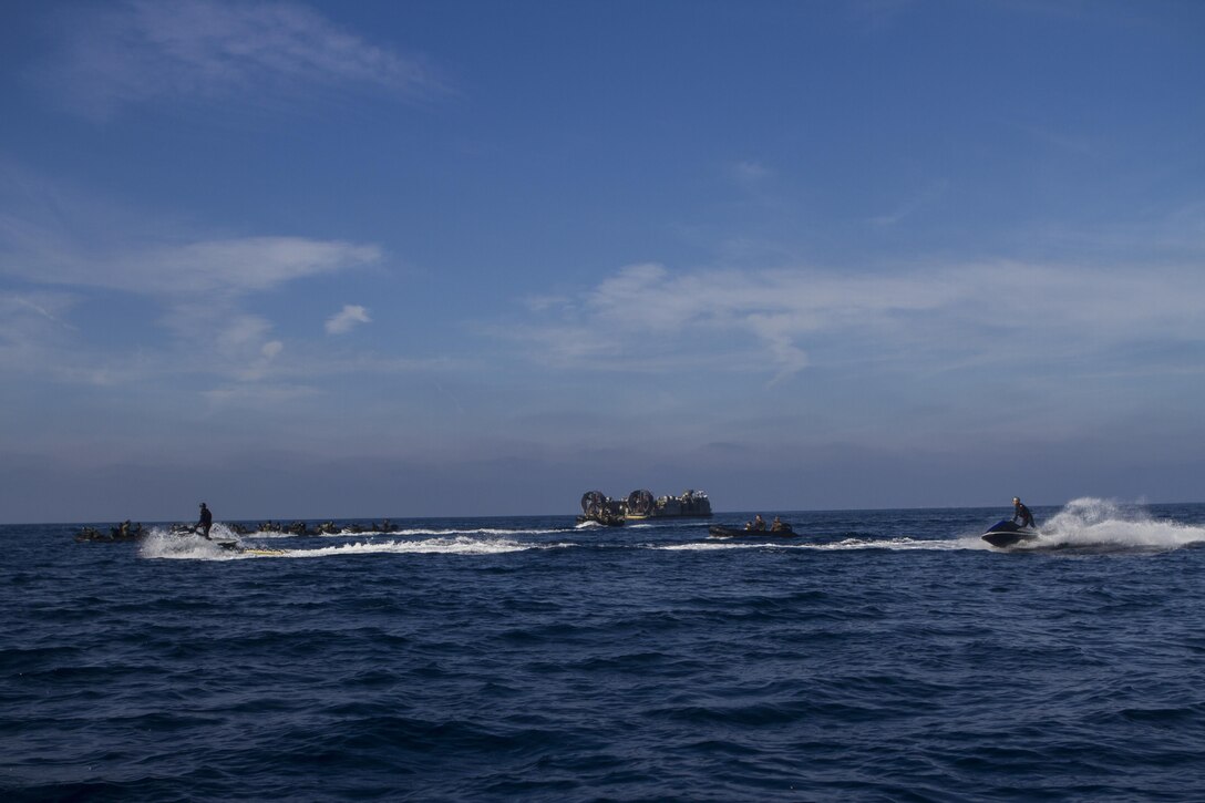 Marines with 1st Reconnaissance Battalion, 1st Marine Division, and members of the Japan Ground Self-Defense Force conduct amphibious raids and military operations on urban terrain aboard Marine Corps Base Camp Pendleton, Calif., Feb. 3, 2015, during Exercise Iron Fist. Exercise Iron Fist is an annual bilateral training exercise between U.S. and Japanese military forces that builds their combined ability to conduct amphibious and land-based contingency operations.