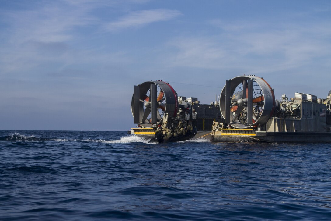 Marines with 1st Reconnaissance Battalion, 1st Marine Division, and members of the Japan Ground Self-Defense Force conduct amphibious raids and military operations on urban terrain aboard Marine Corps Base Camp Pendleton, Calif., Feb. 3, 2015, during Exercise Iron Fist. Exercise Iron Fist is an annual bilateral training exercise between U.S. and Japanese military forces that builds their combined ability to conduct amphibious and land-based contingency operations.