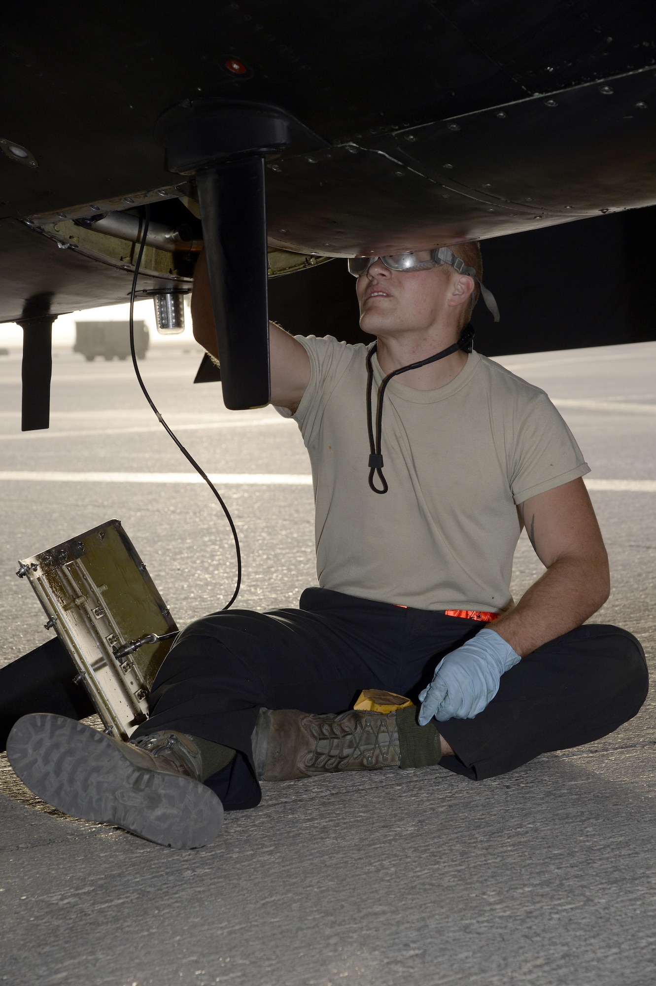 Airman 1st Class Cameron, U-2 Dragon Lady crew chief, performs a post-flight inspection on a U-2 Dragon Lady at an undisclosed location in Southwest Asia Feb. 9, 2015. Crew chiefs are responsible for ensuring the plane is ready for the next mission. Cameron is currently deployed from Beale Air Force Base, Calif., and is a native of Harned, Ky. (U.S. Air Force photo/Tech. Sgt. Marie Brown)
