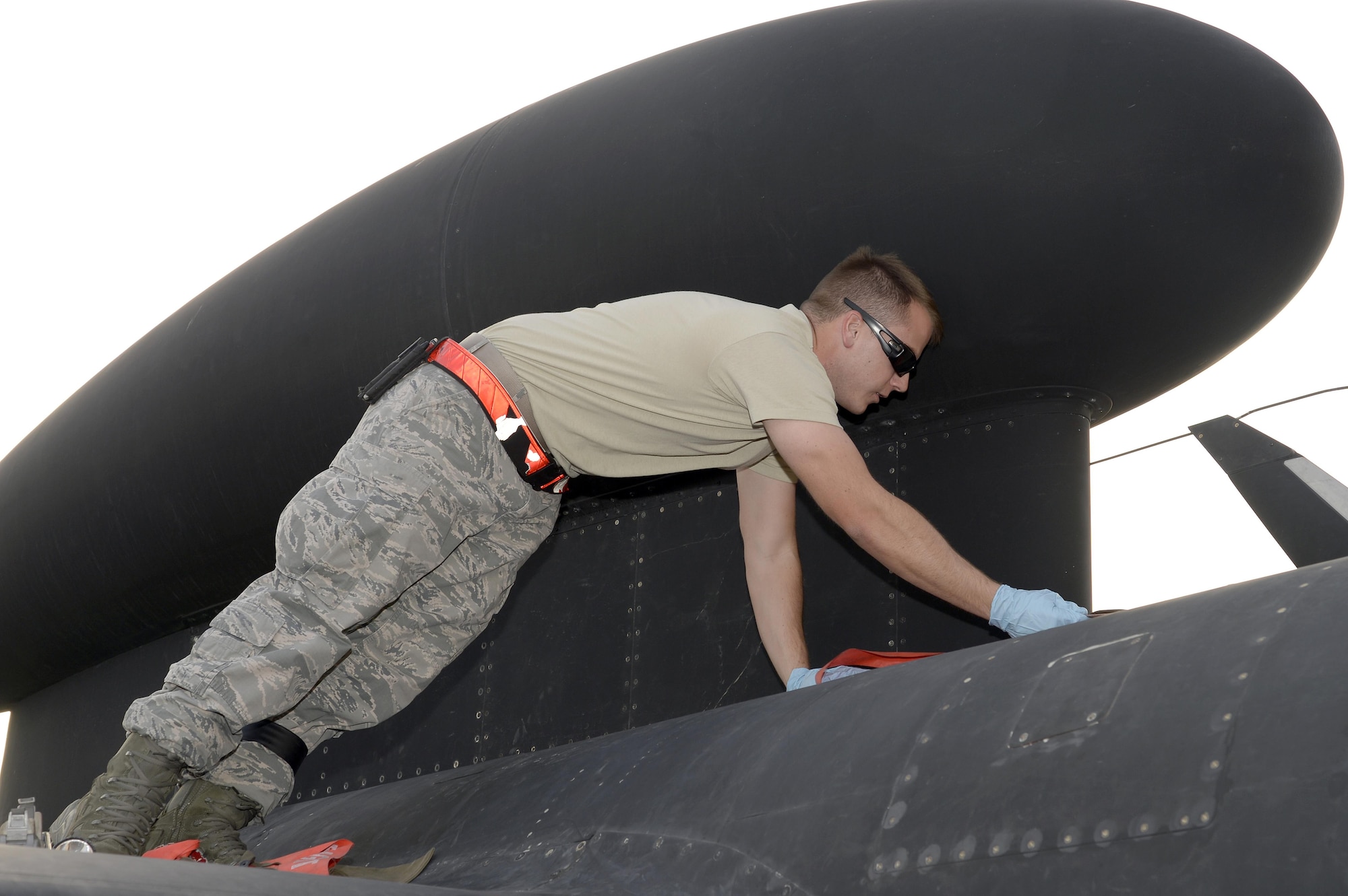 Senior Airman Jordan, Dragon Aircraft Maintenance Unit, prepares to do a post-flight inspection on a U-2 Dragon Lady at an undisclosed location in Southwest Asia Feb. 9, 2015. The capability the Dragon AMU provides to the warfighter not only on the ground but all across this area of responsibility is a unique capability that isn’t found in very many other places around the world. Jordan is currently deployed from Beale Air Force Base, Calif. (U.S. Air Force photo/Tech. Sgt. Marie Brown) 